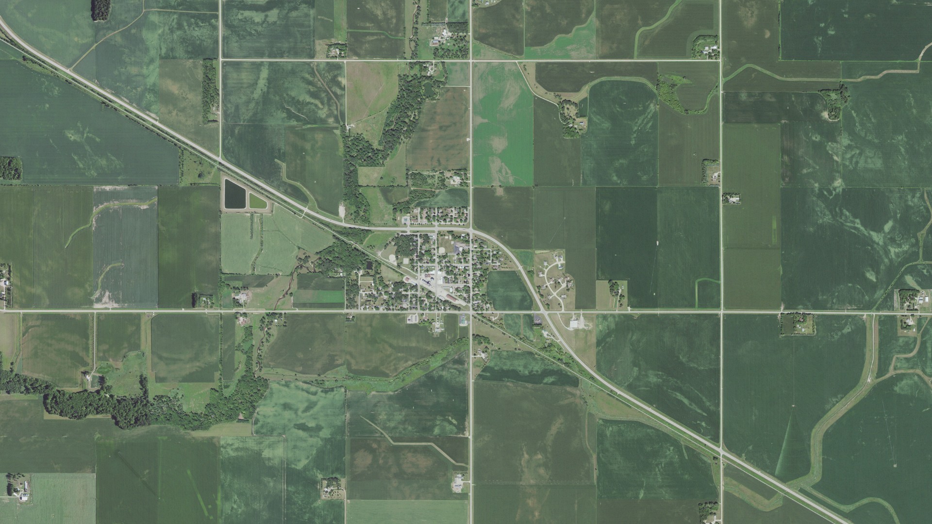 Natural-color aerial photograph of land around Rose Creek, Minnesota