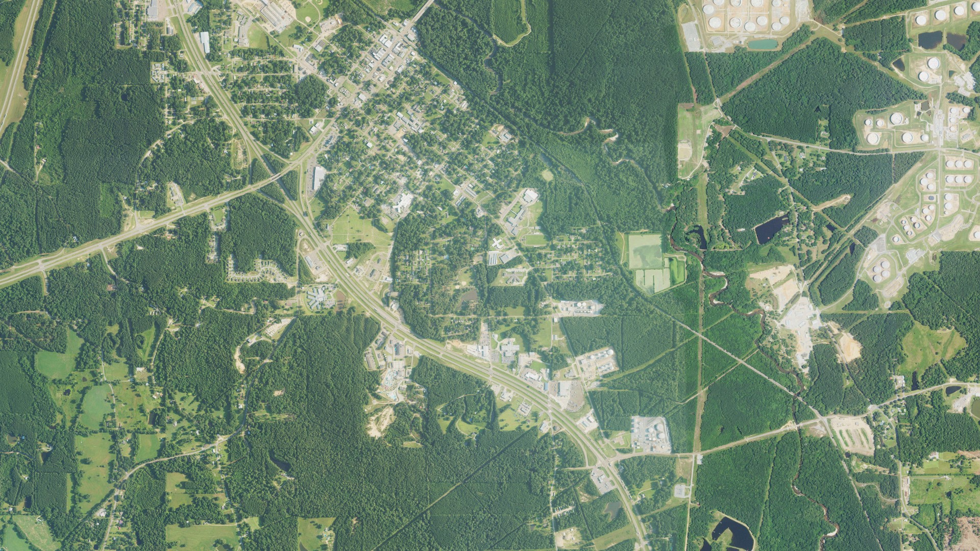 Natural-color aerial photograph of land around Covington County, Mississippi