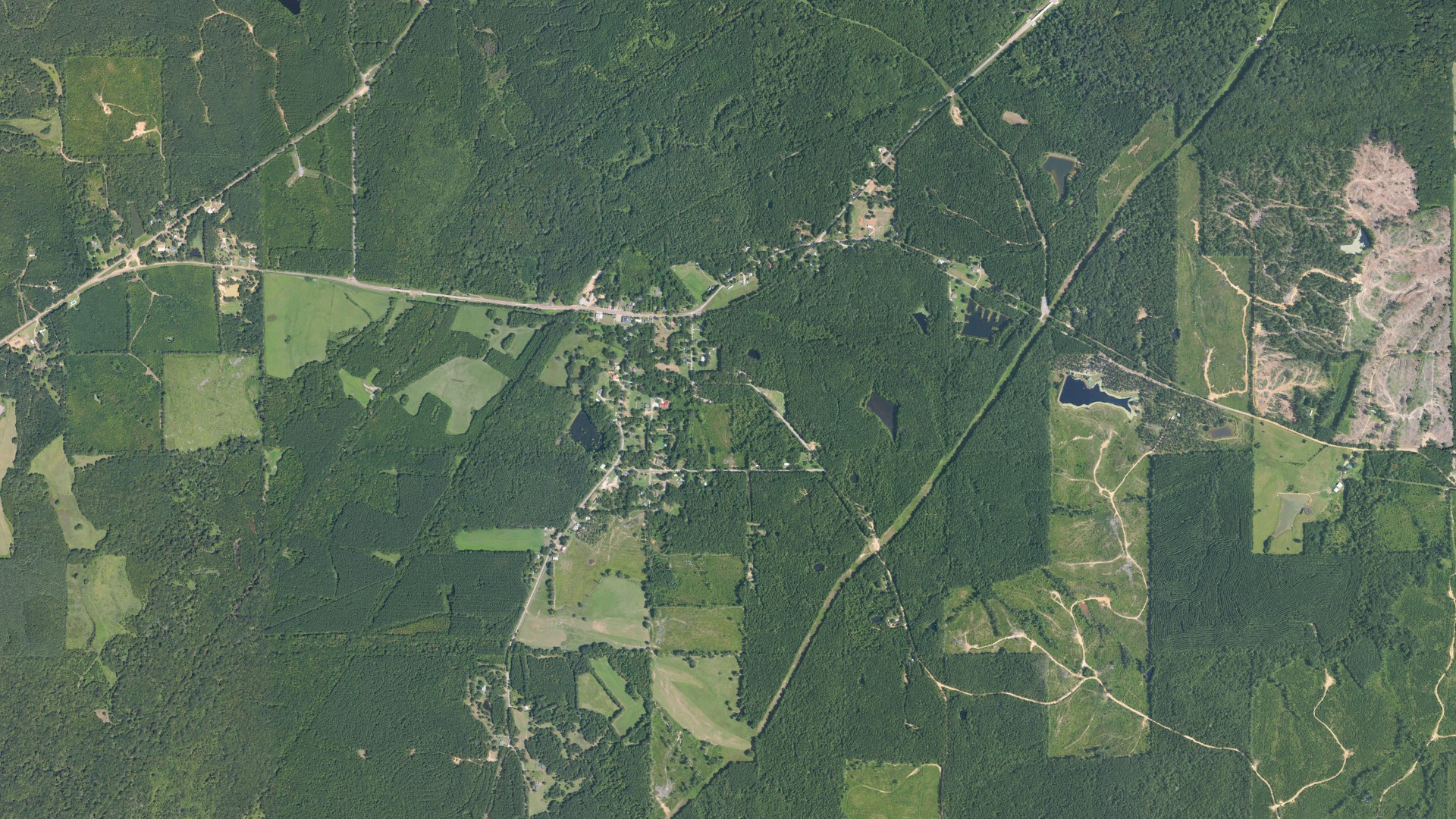 Natural-color aerial photograph of land around McCool, Mississippi