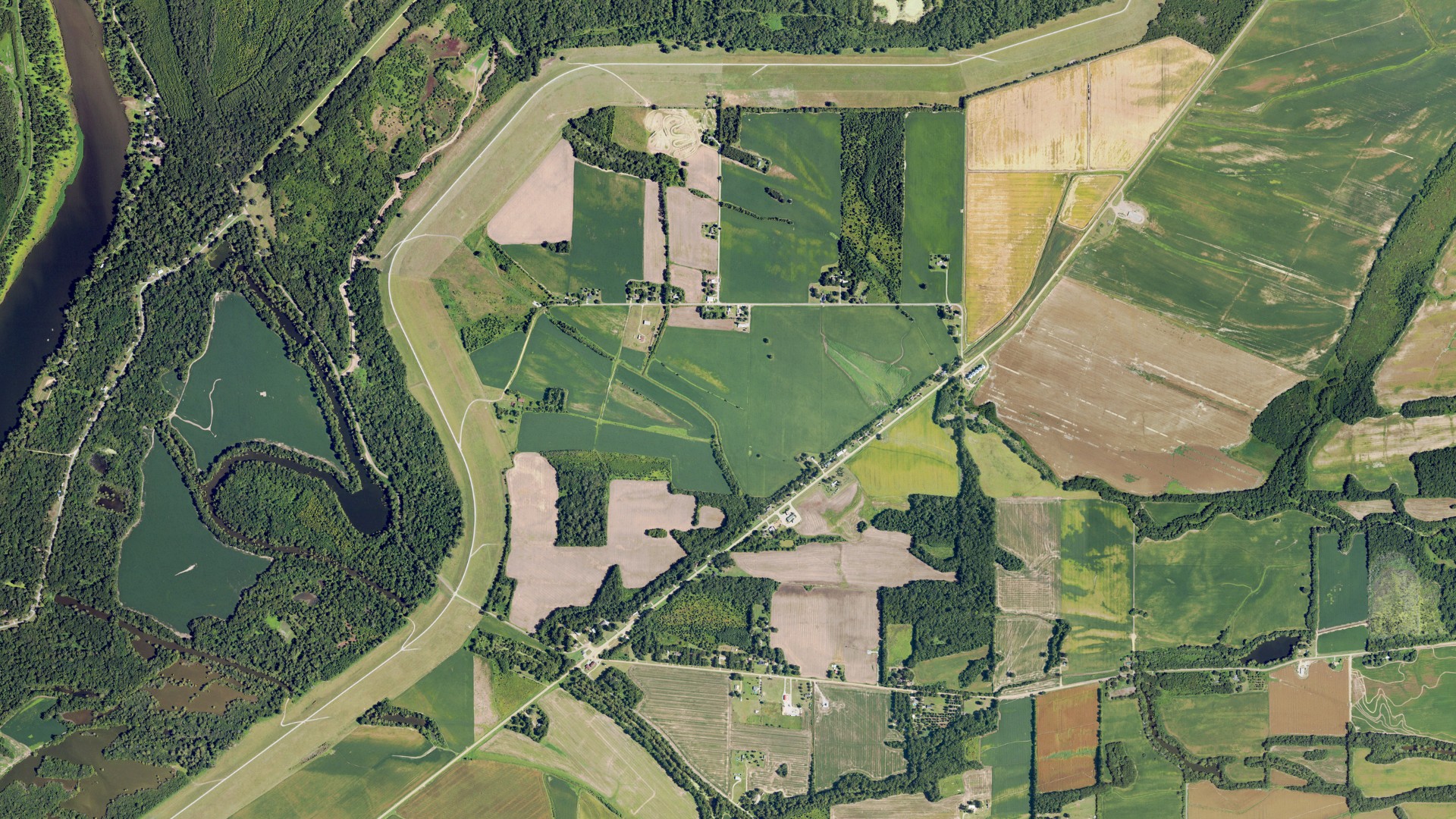 Natural-color aerial photograph of land around Rena Lara, Mississippi