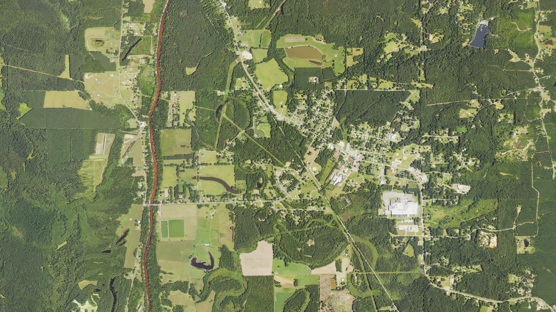 Natural-color aerial photograph of land around Stonewall, Mississippi