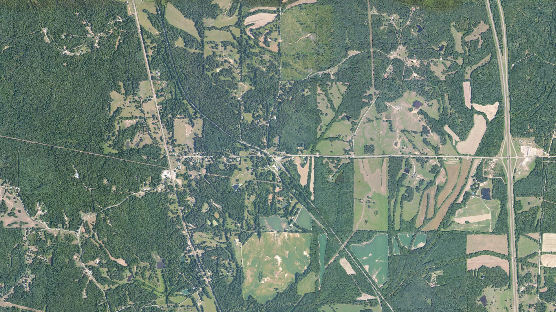 Natural-color aerial photograph of land around Tillatoba, Mississippi