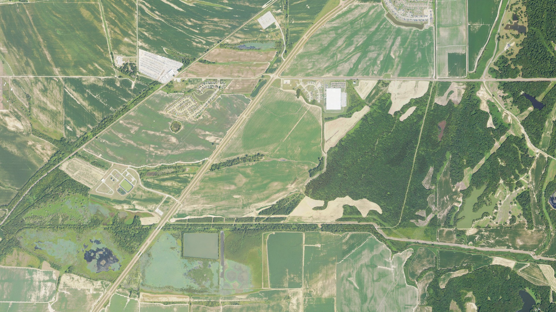 Natural-color aerial photograph of land around Walls, Mississippi