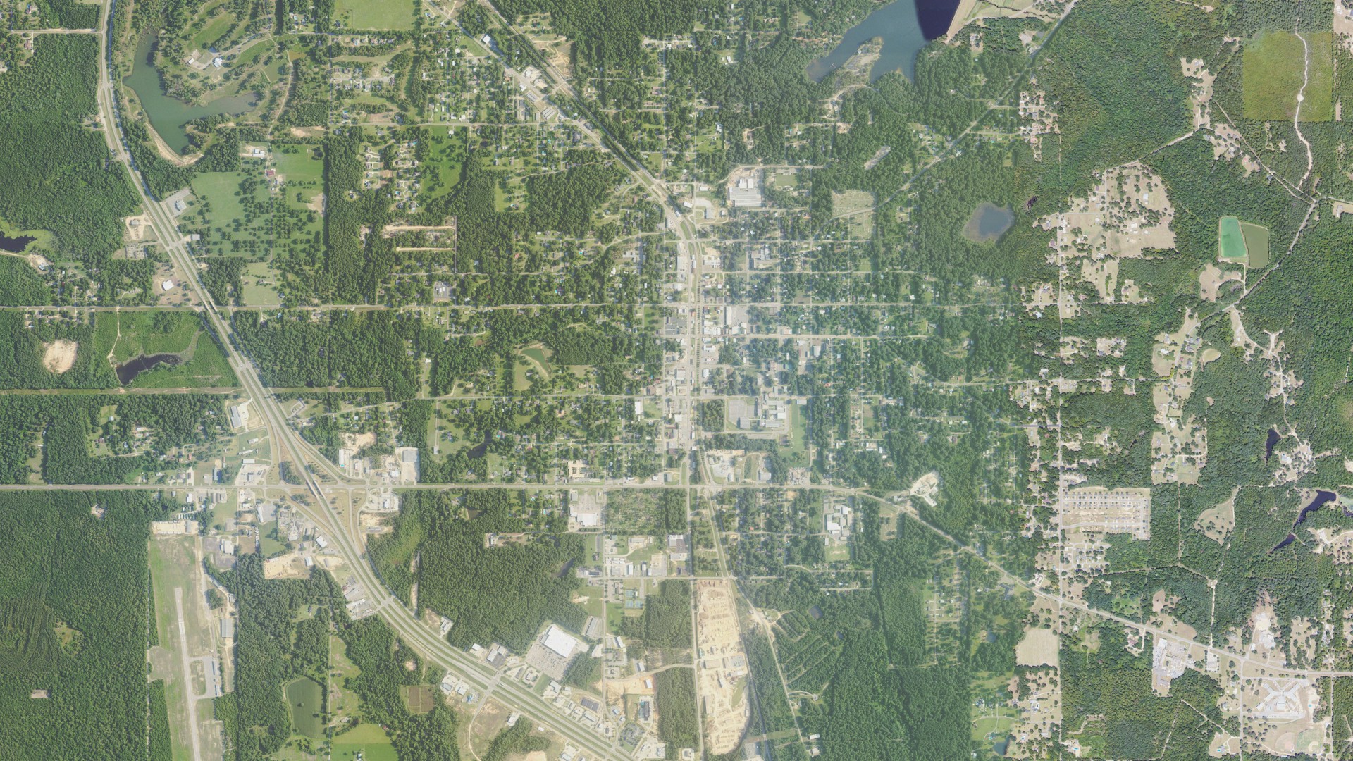 Natural-color aerial photograph of land around Wiggins, Mississippi