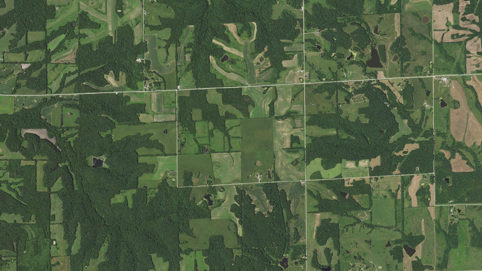 Natural-color aerial photograph of land around Hill, Missouri