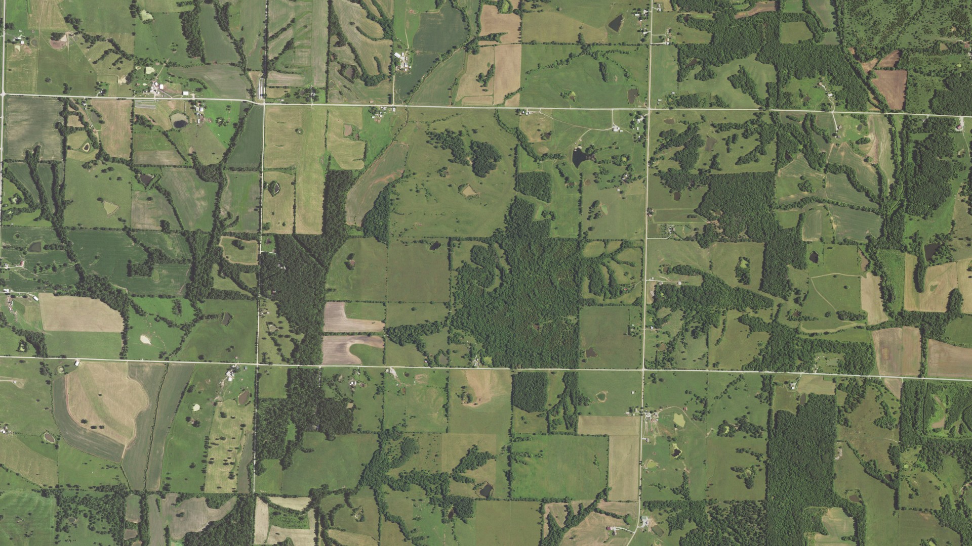 Natural-color aerial photograph of land around Clark, Missouri