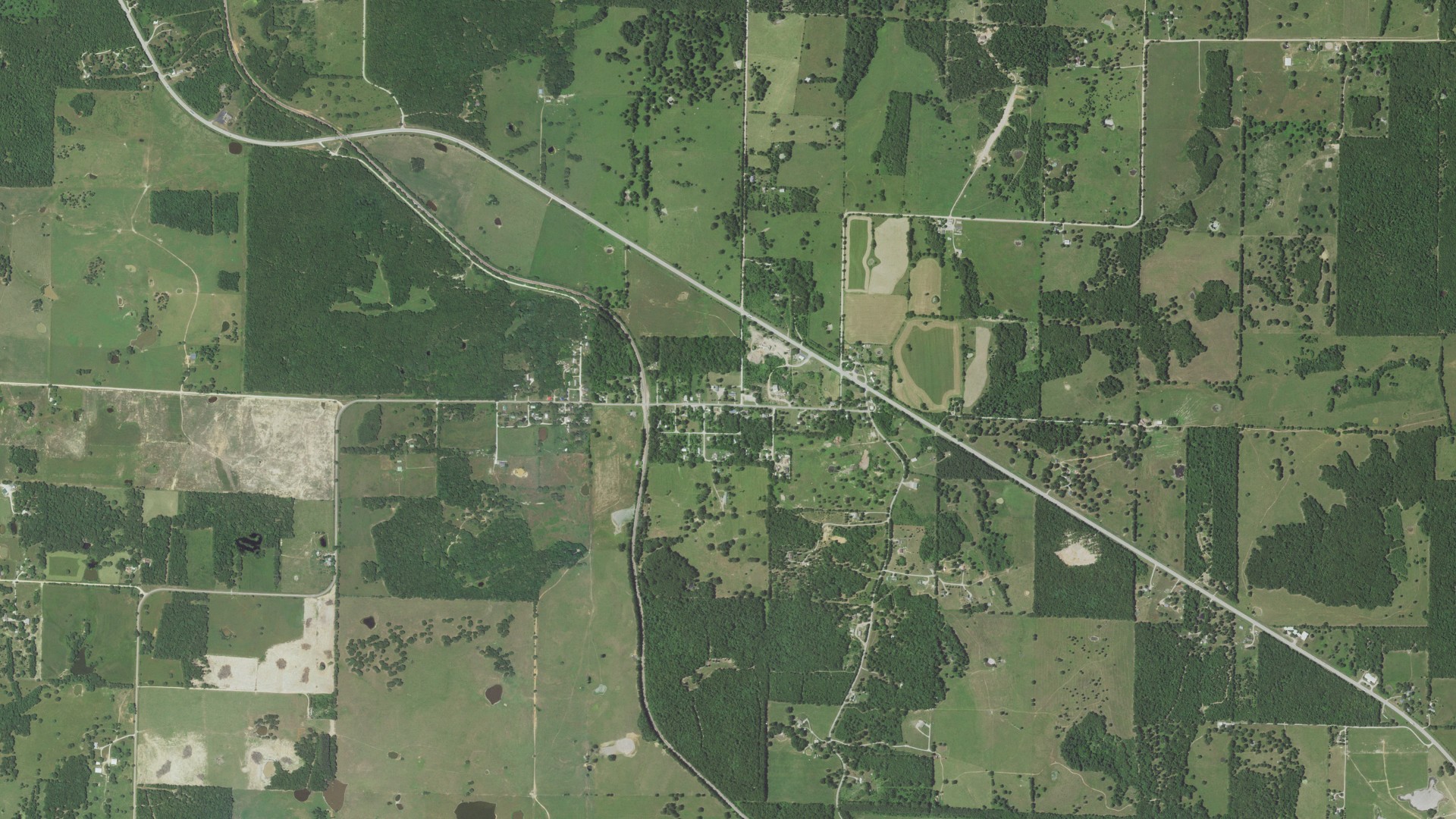 Natural-color aerial photograph of land around Brandsville, Missouri