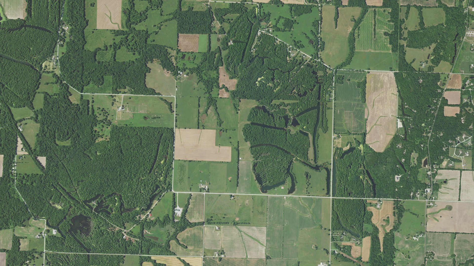 Natural-color aerial photograph of land around Fields Creek, Missouri