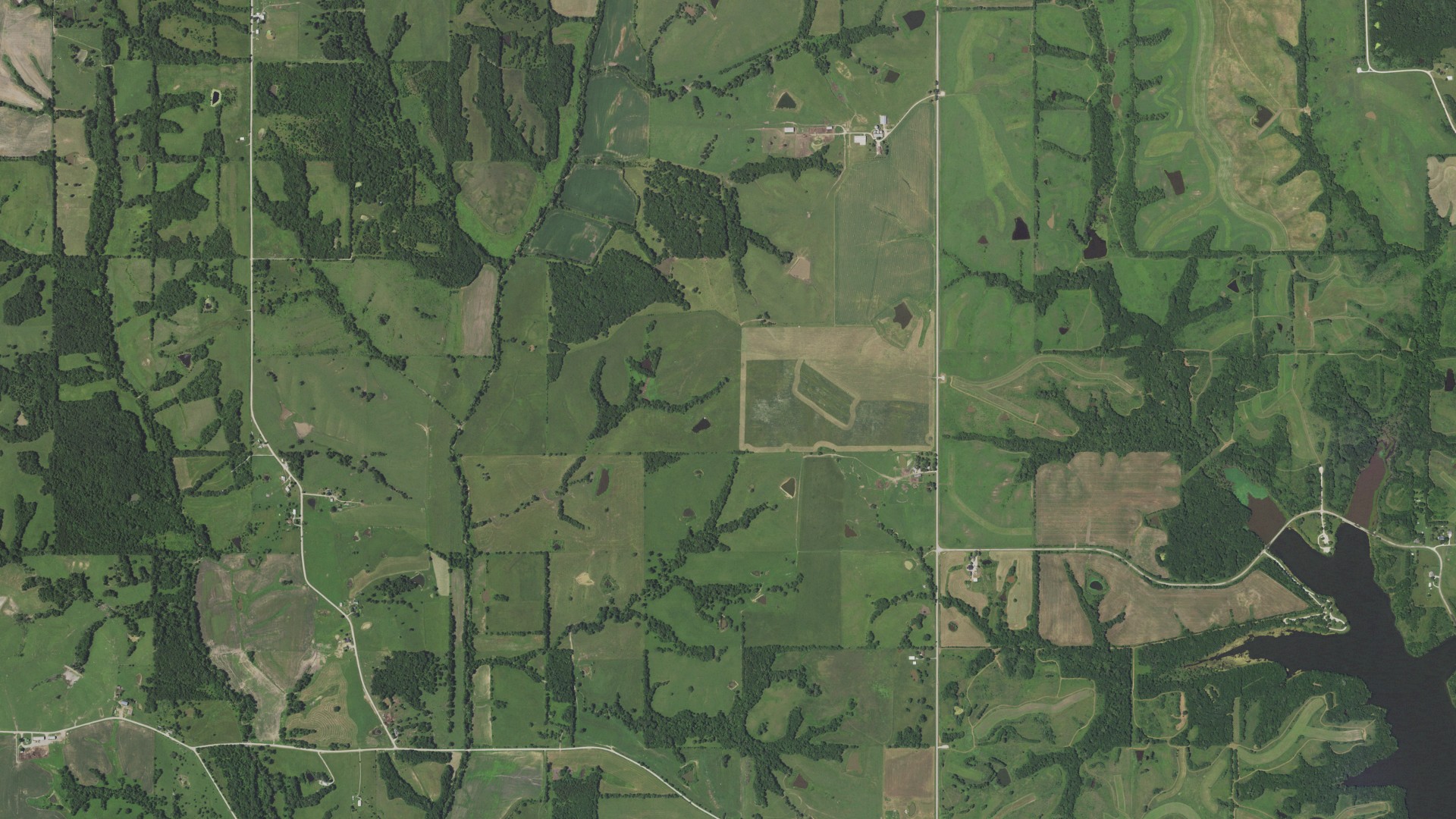 Natural-color aerial photograph of land around Harrison, Missouri