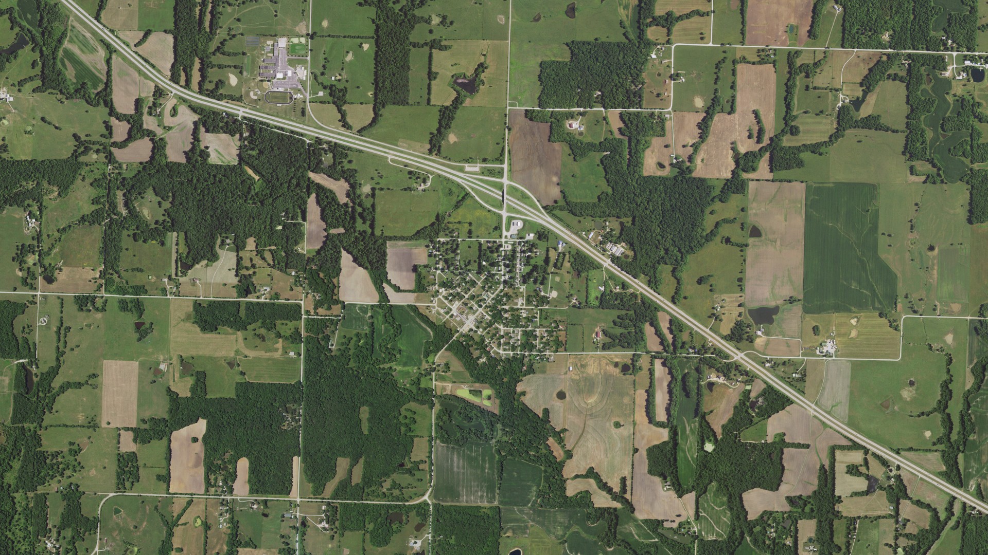 Natural-color aerial photograph of land around Creighton, Missouri