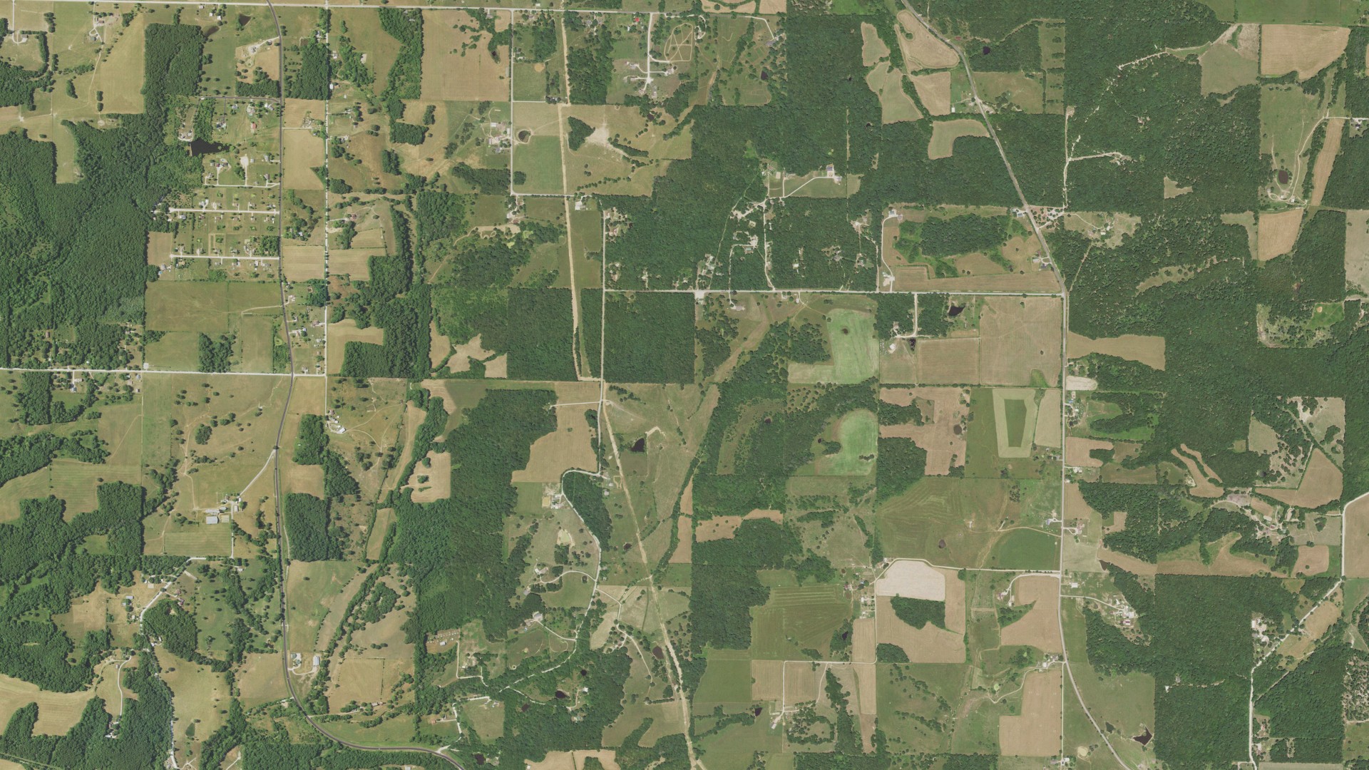 Natural-color aerial photograph of land around Webster County, Missouri