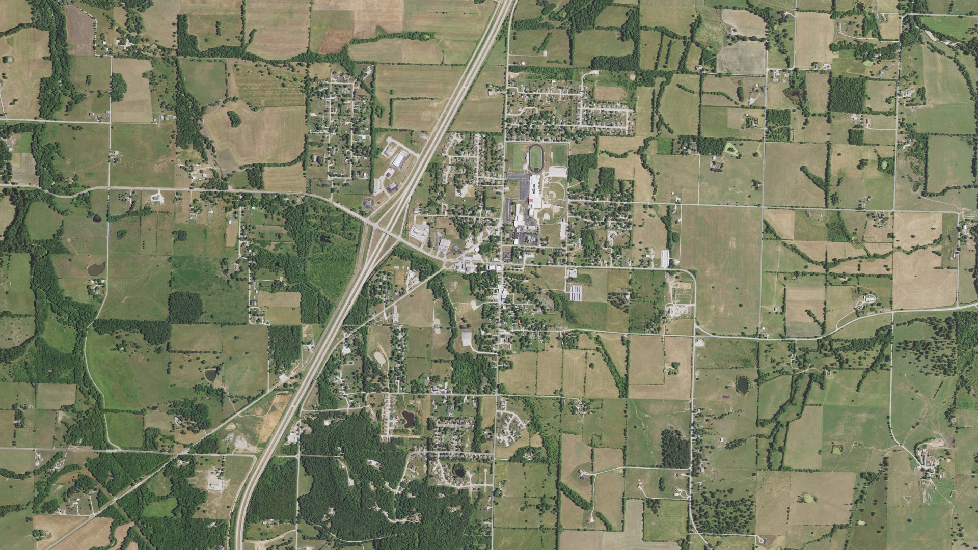 Natural-color aerial photograph of land around Fair Grove, Missouri