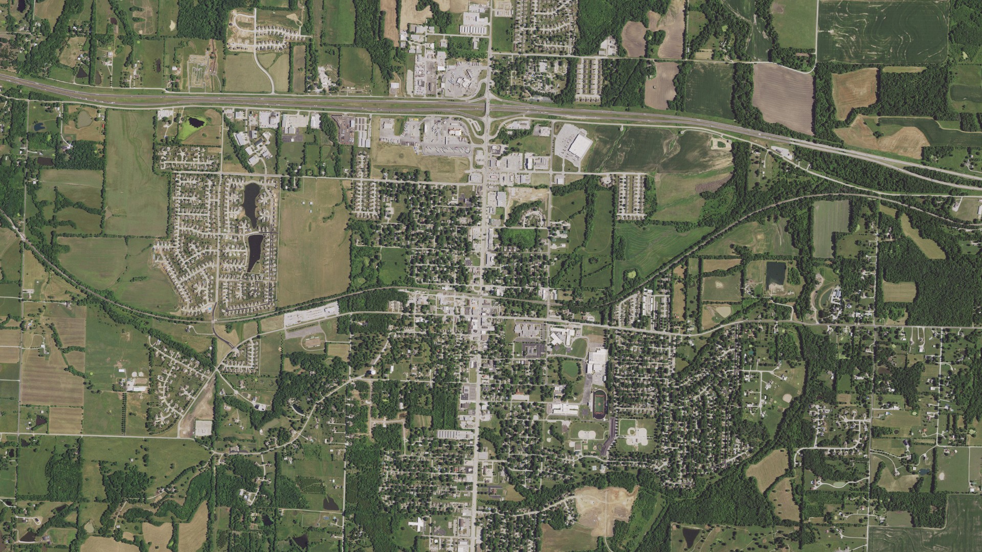 Natural-color aerial photograph of land around Oak Grove, Missouri