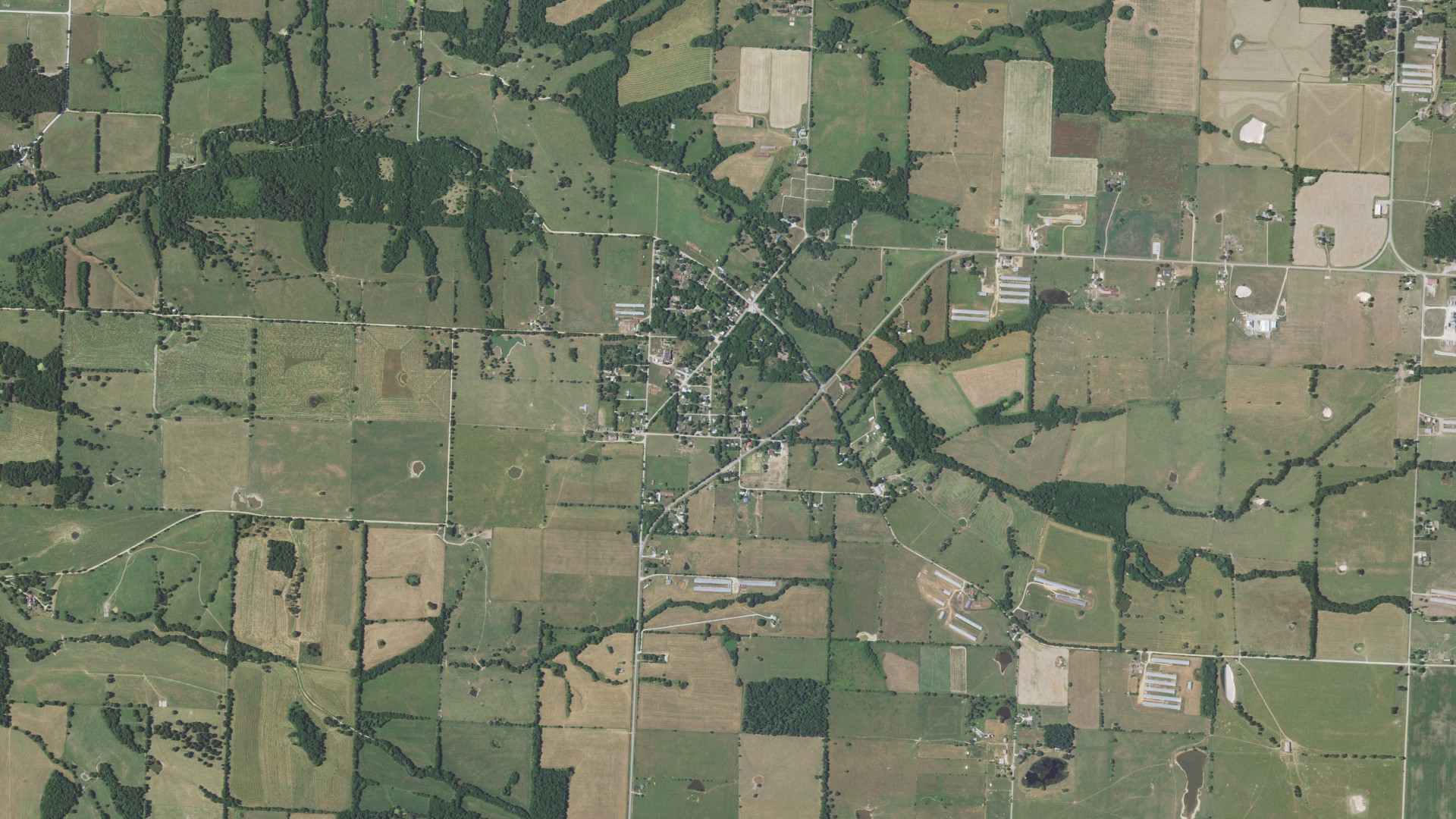 Natural-color aerial photograph of land around Rocky Comfort, Missouri