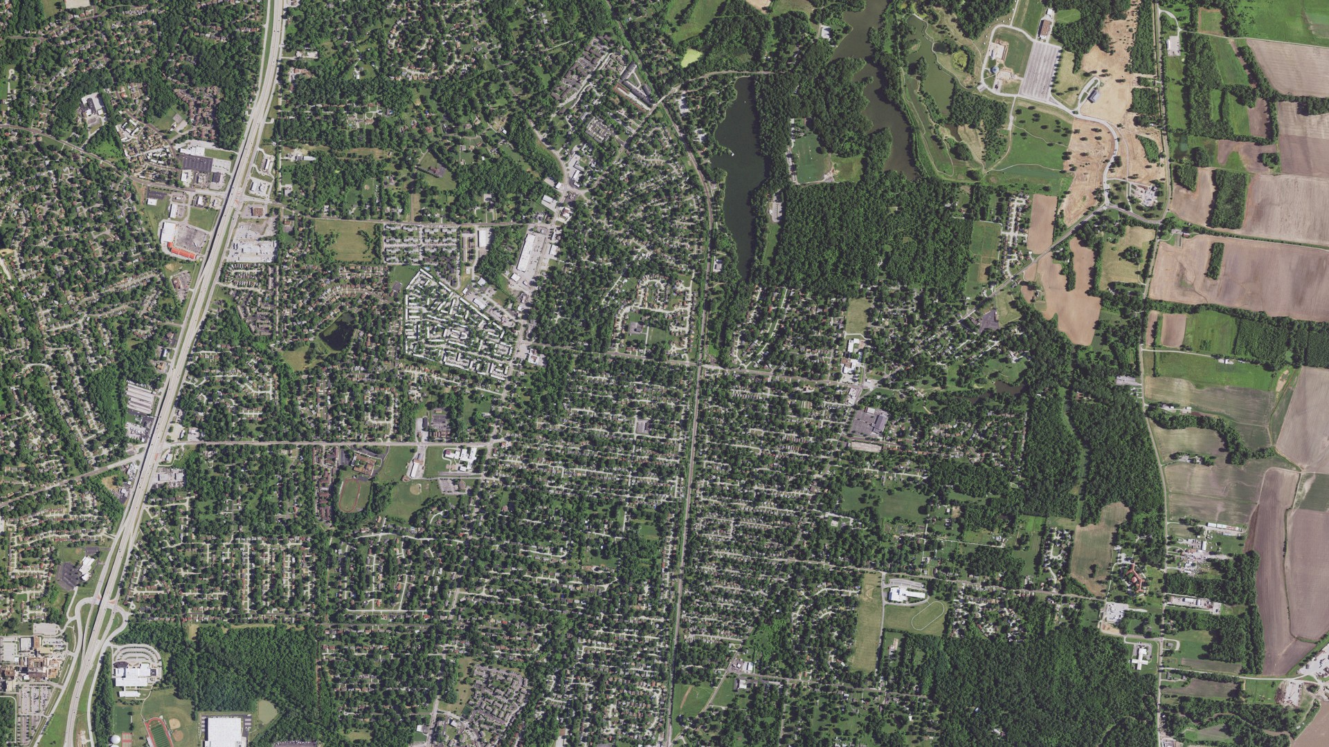 Natural-color aerial photograph of land around Spanish Lake, Missouri