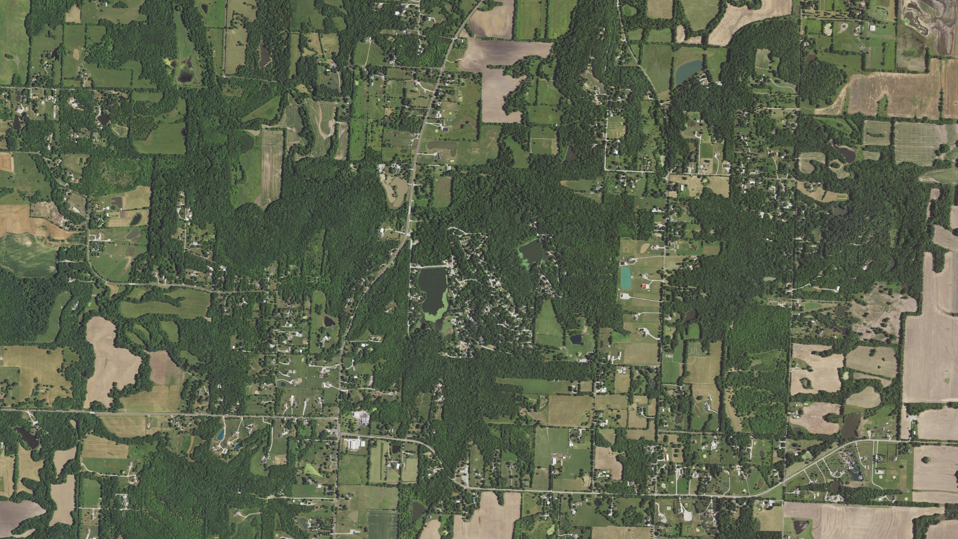 Natural-color aerial photograph of land around Tarsney Lakes, Missouri