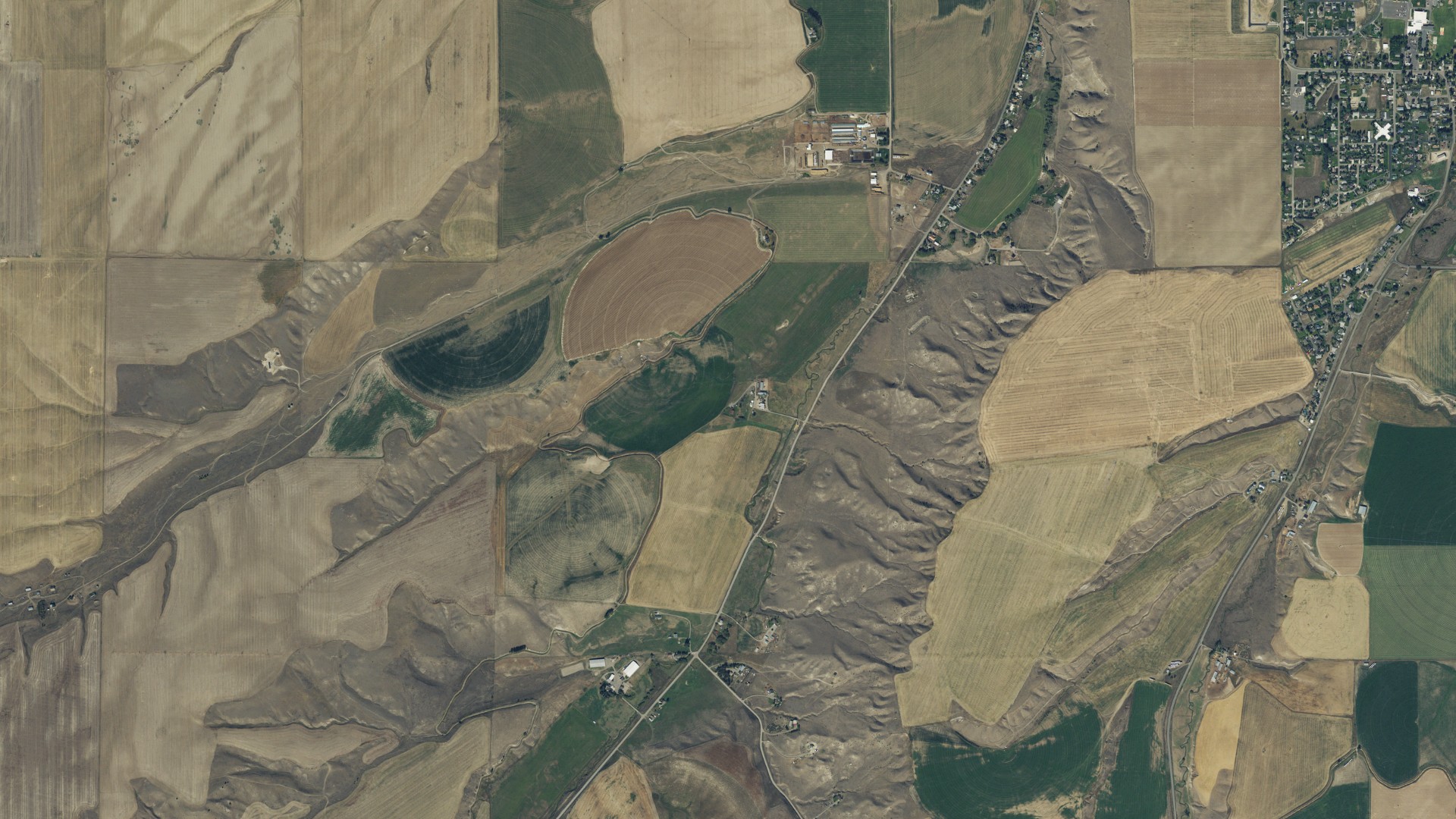 Natural-color aerial photograph of land around Amsterdam, Montana