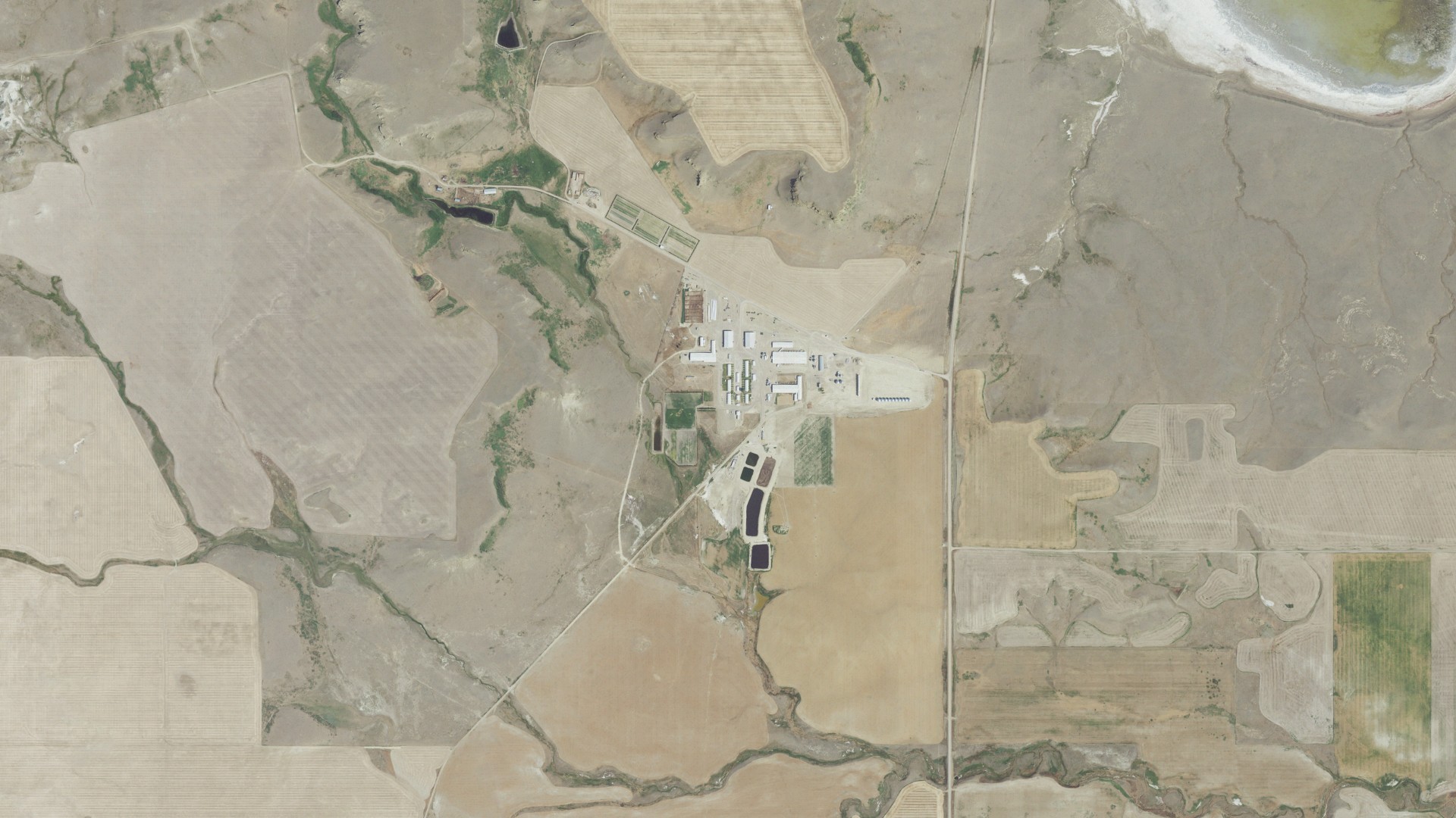 Natural-color aerial photograph of land around Big Sky Colony, Montana