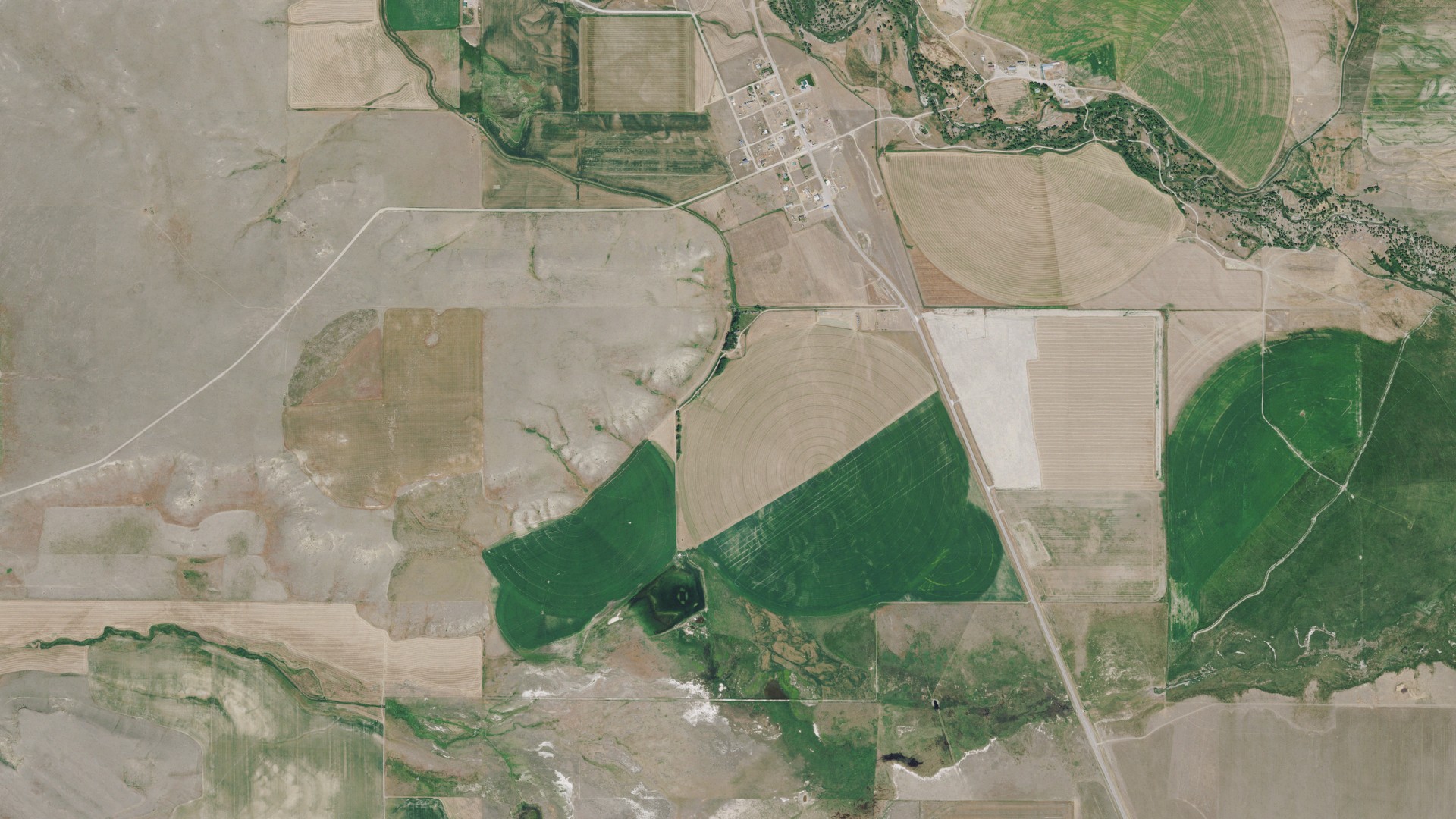 Natural-color aerial photograph of land around Bynum, Montana