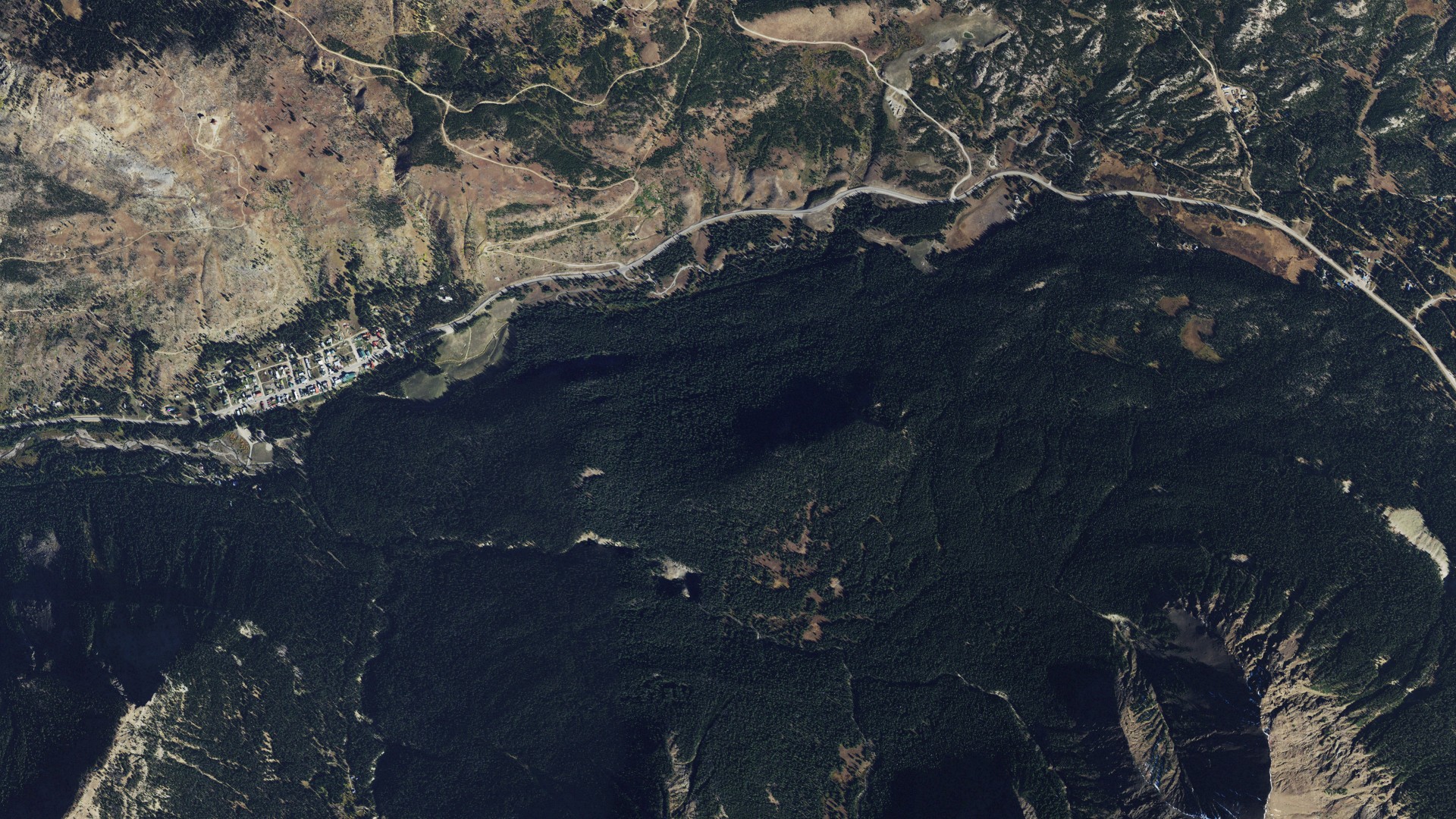 Natural-color aerial photograph of land around Cooke City, Montana