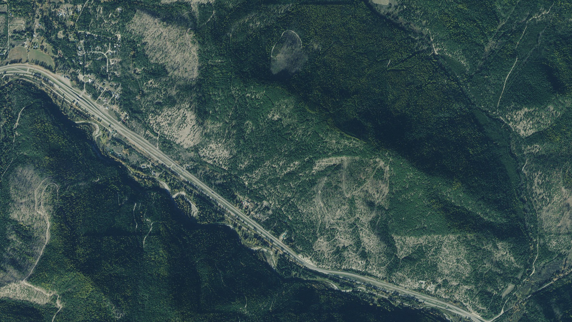 Natural-color aerial photograph of land around De Borgia, Montana