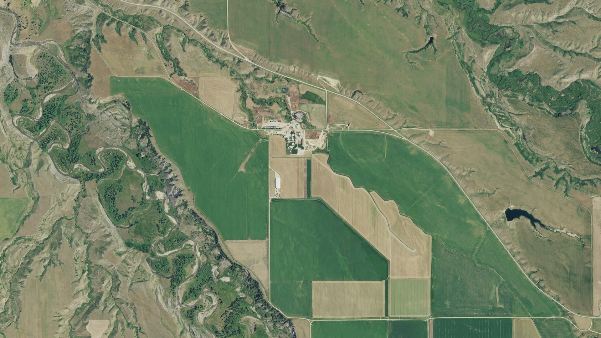 Natural-color aerial photograph of land around Deerfield Colony, Montana