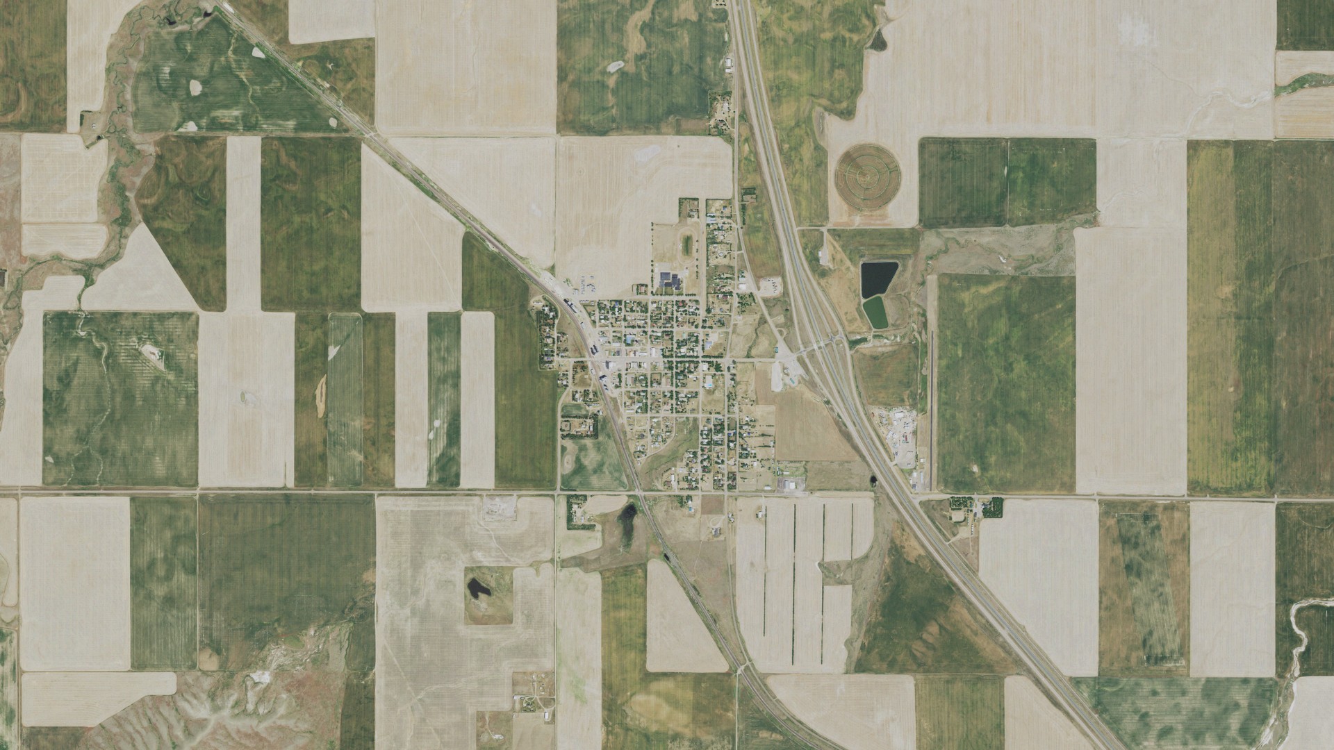 Natural-color aerial photograph of land around Dutton, Montana