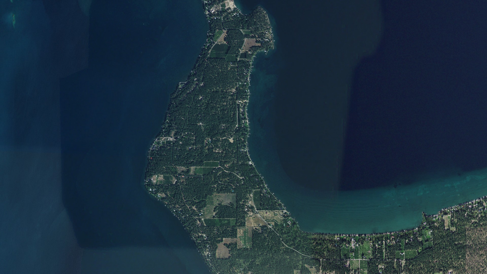 Natural-color aerial photograph of land around Finley Point, Montana