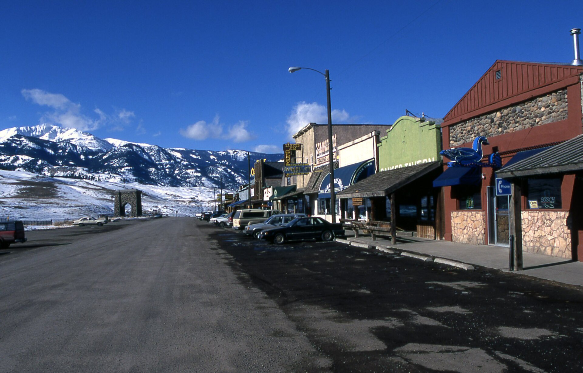 Downtown Gardiner, Montana with Electric Peak & the Roosevelt Arch in the background, February 1999