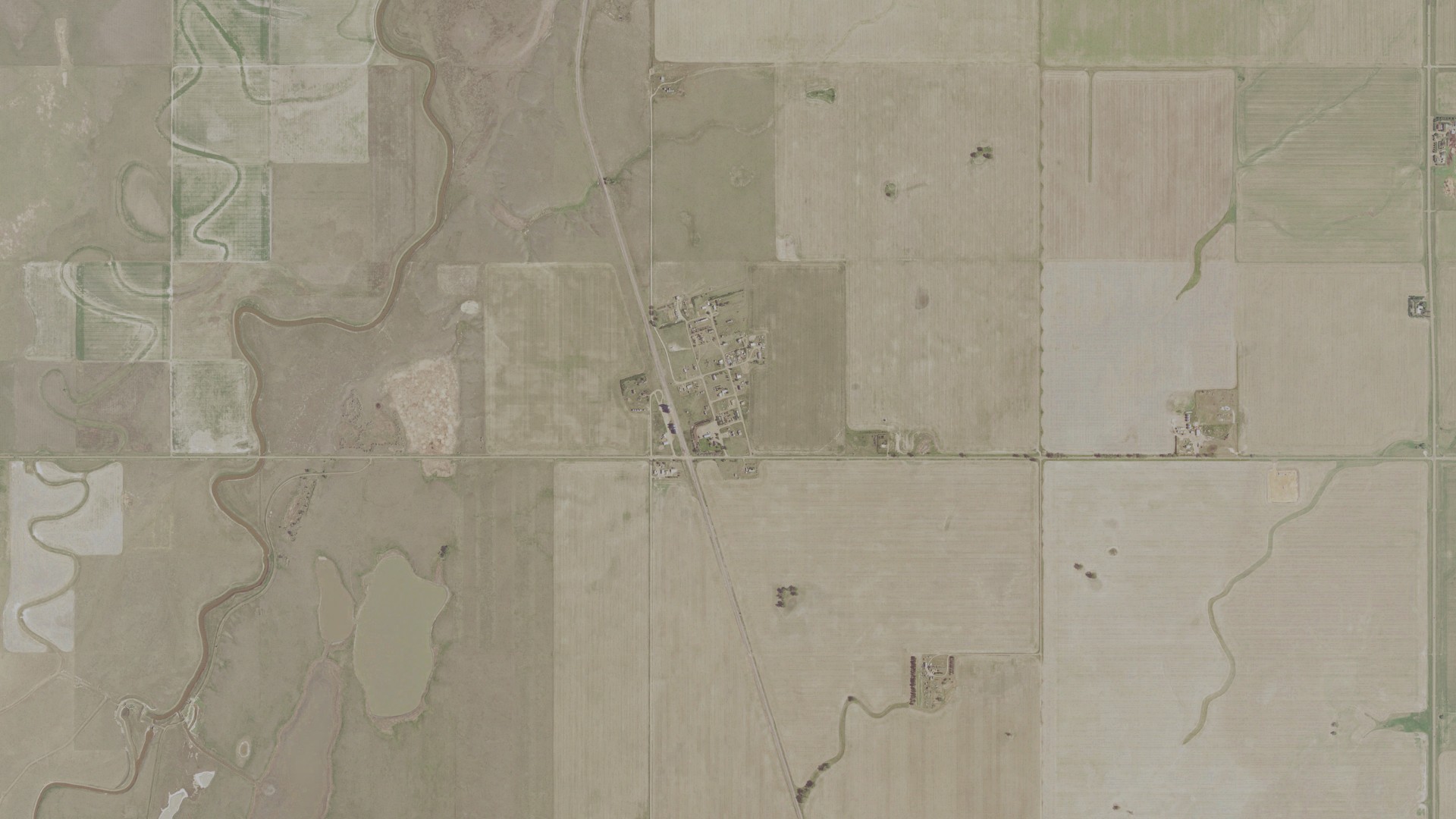 Natural-color aerial photograph of land around Homestead, Montana