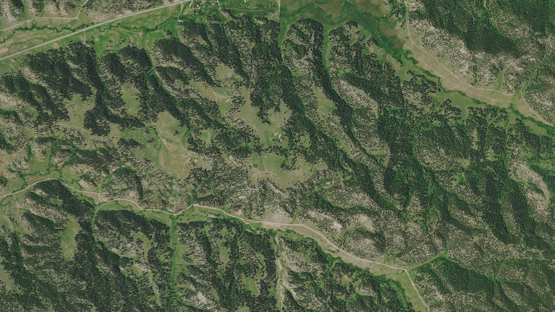 Natural-color aerial photograph of land around Lame Deer, Montana