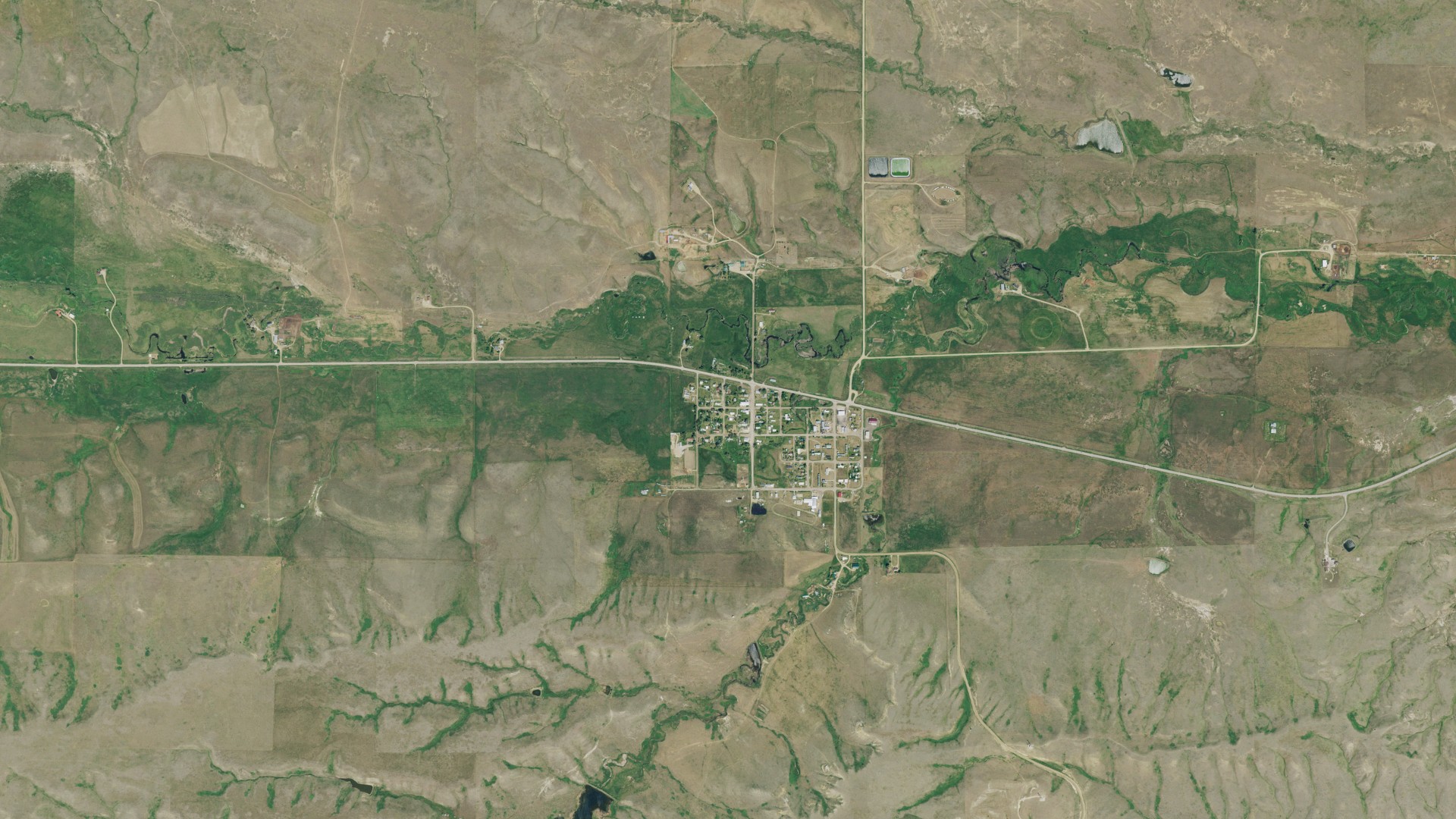 Natural-color aerial photograph of land around Roy, Montana