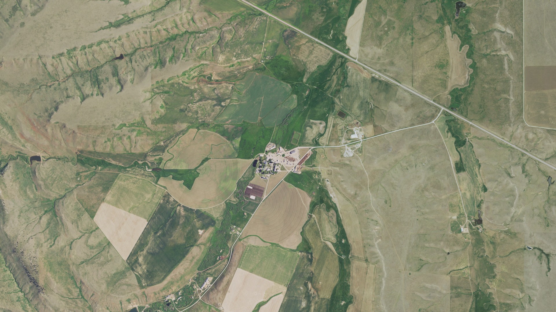 Natural-color aerial photograph of land around Surprise Creek Colony, Montana