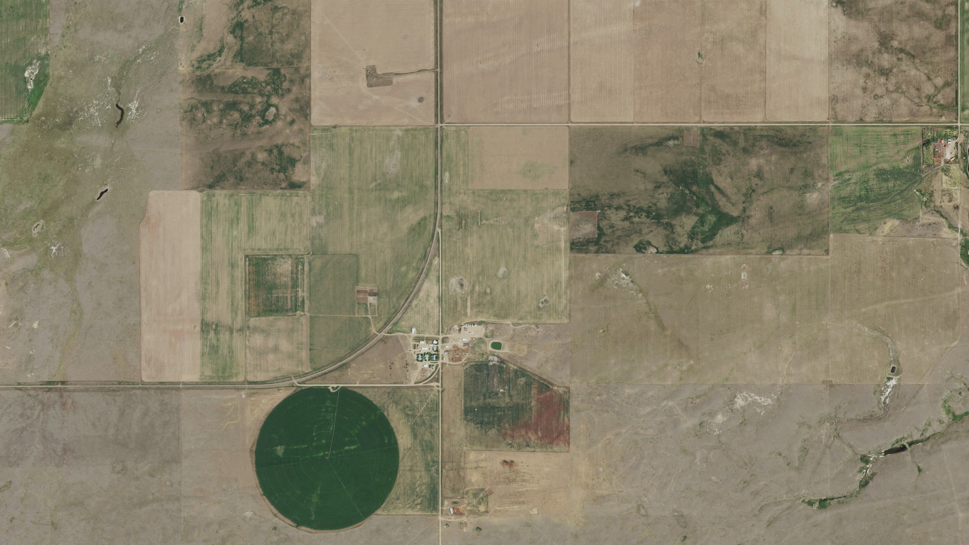 Natural-color aerial photograph of land around Turner Colony, Montana