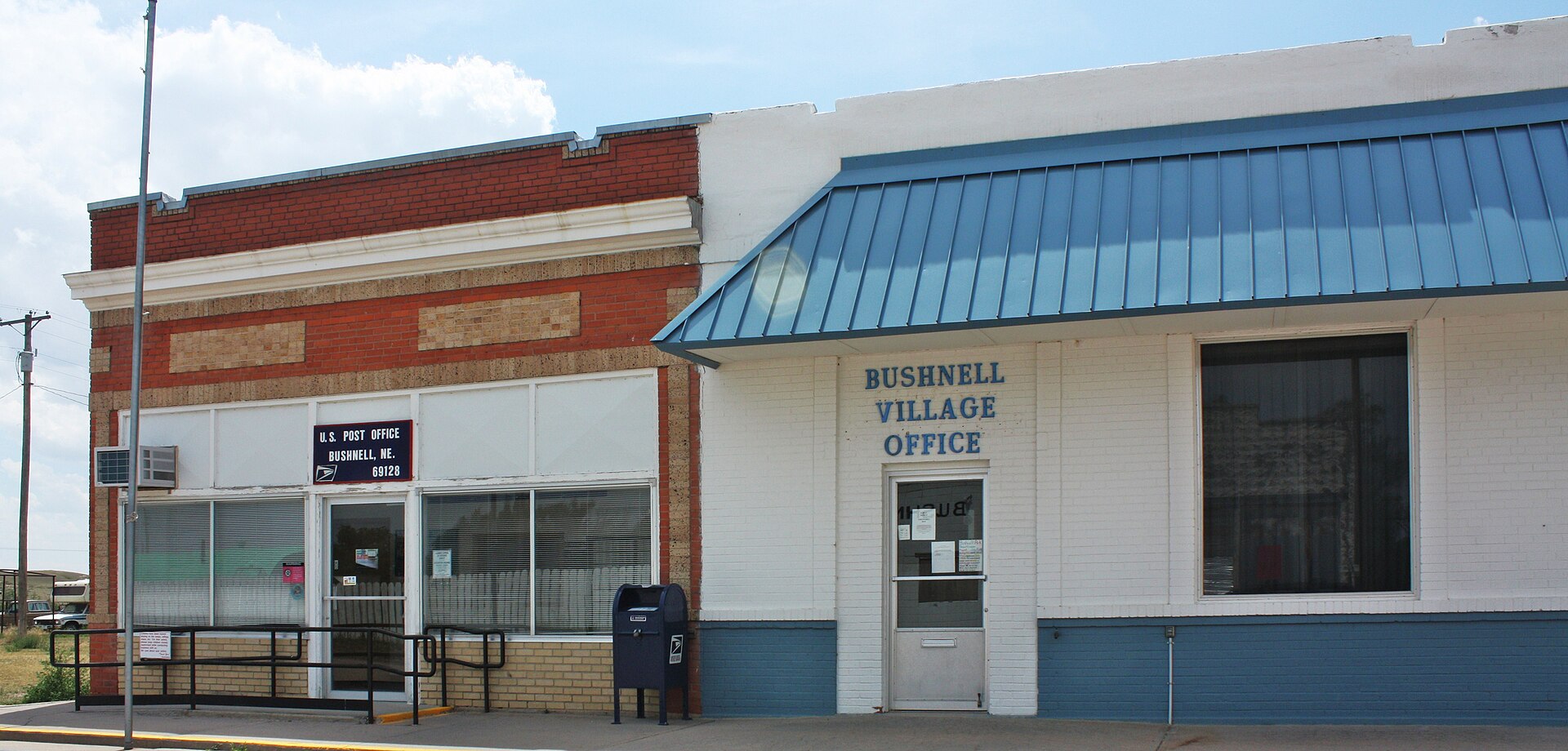 U.S. Postal Service office and Village Hall in Bushnell, Nebraska.