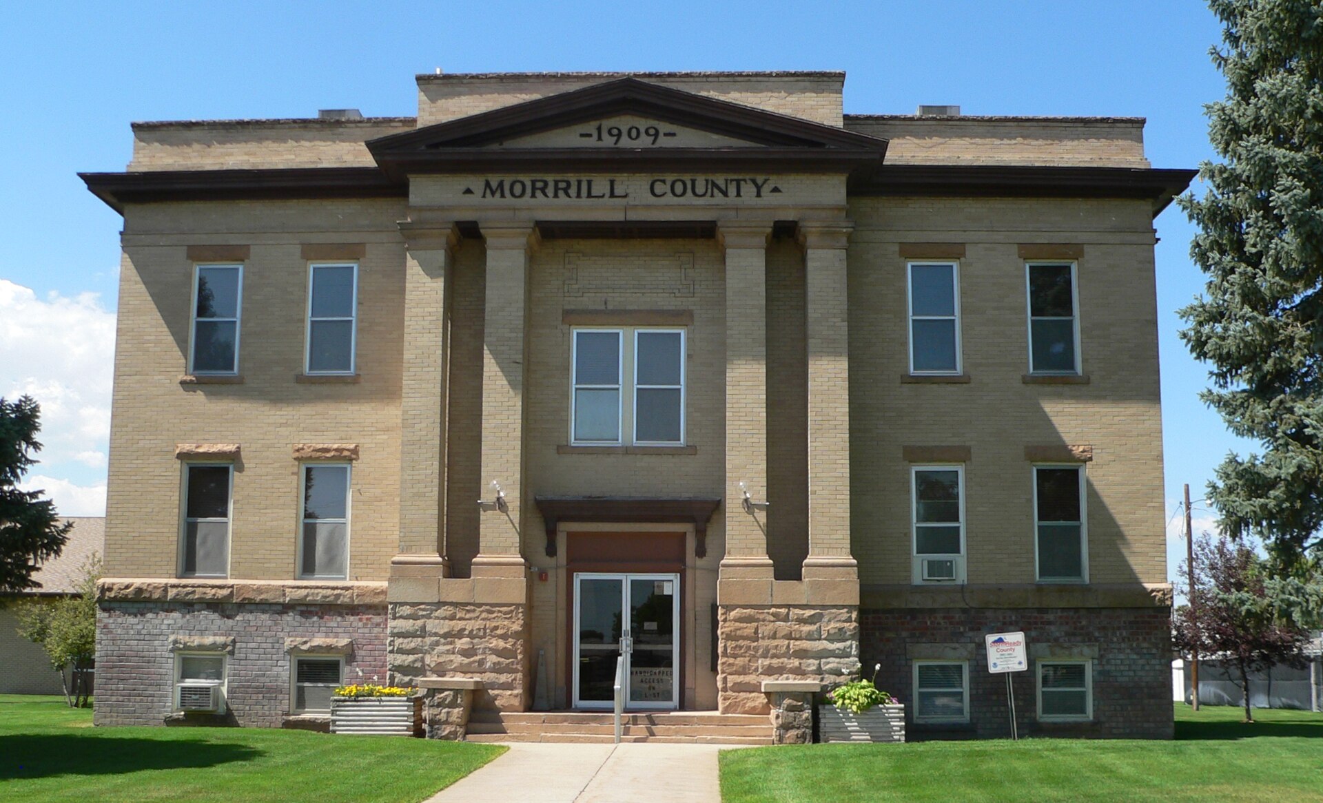Morrill County Courthouse in Bridgeport, Nebraska; seen from the east. The Classical Revival building was constructed in 1909. It is listed in the National Register of Historic Places.