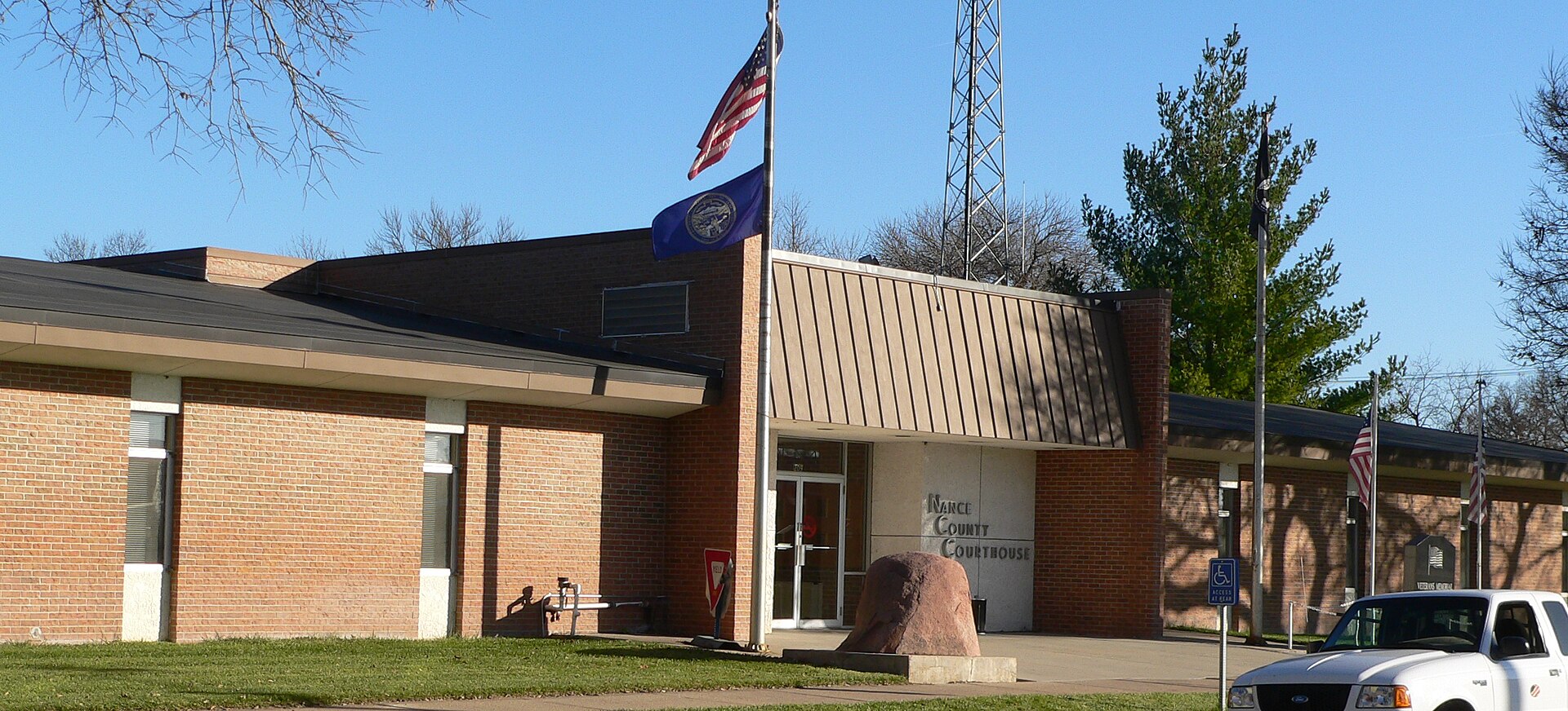 Front (west) entrance of Nance County Courthouse, located in Fullerton, Nebraska. The building was constructed in 1974.