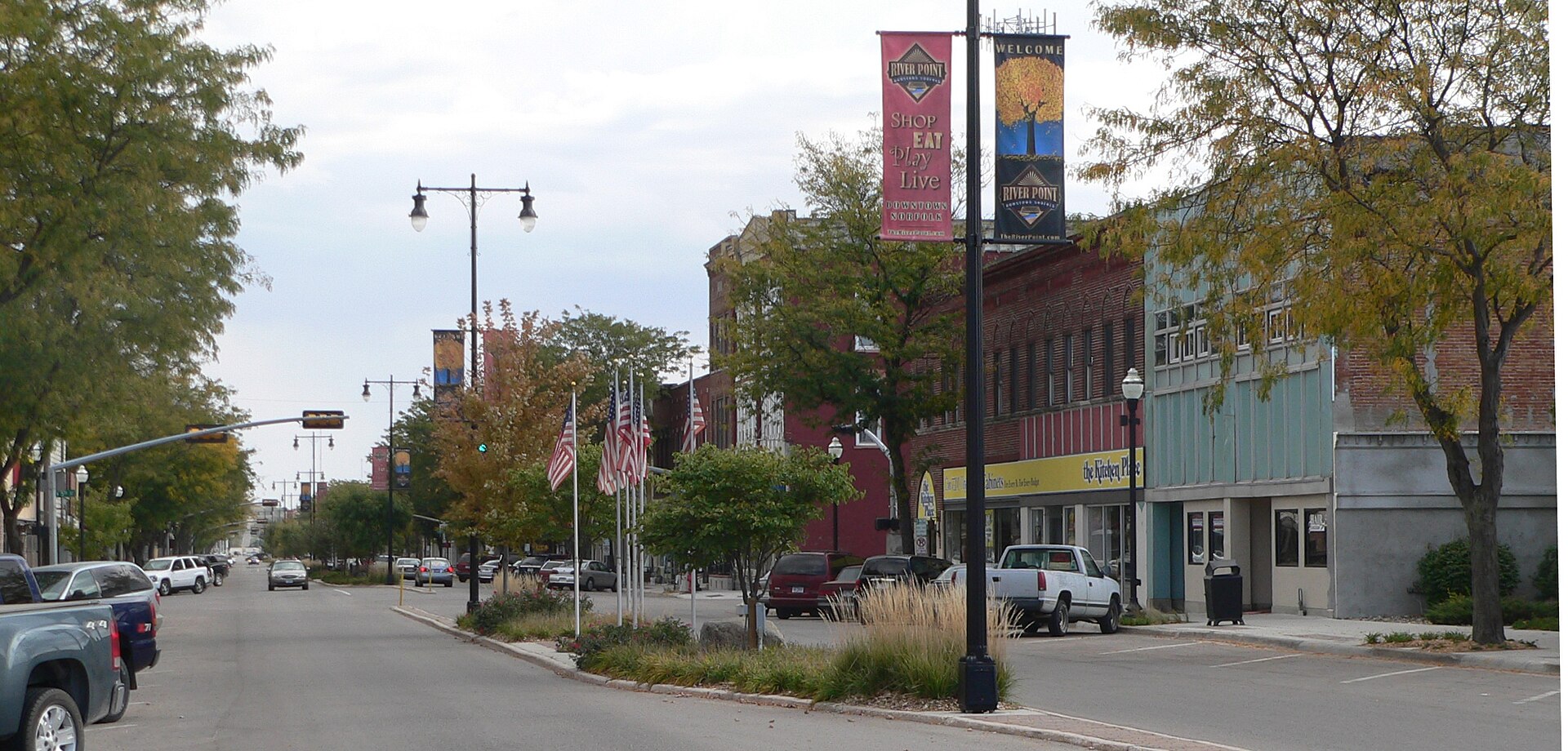South side of Norfolk Avenue in downtown Norfolk, Nebraska: looking southeast from about 6th Street.