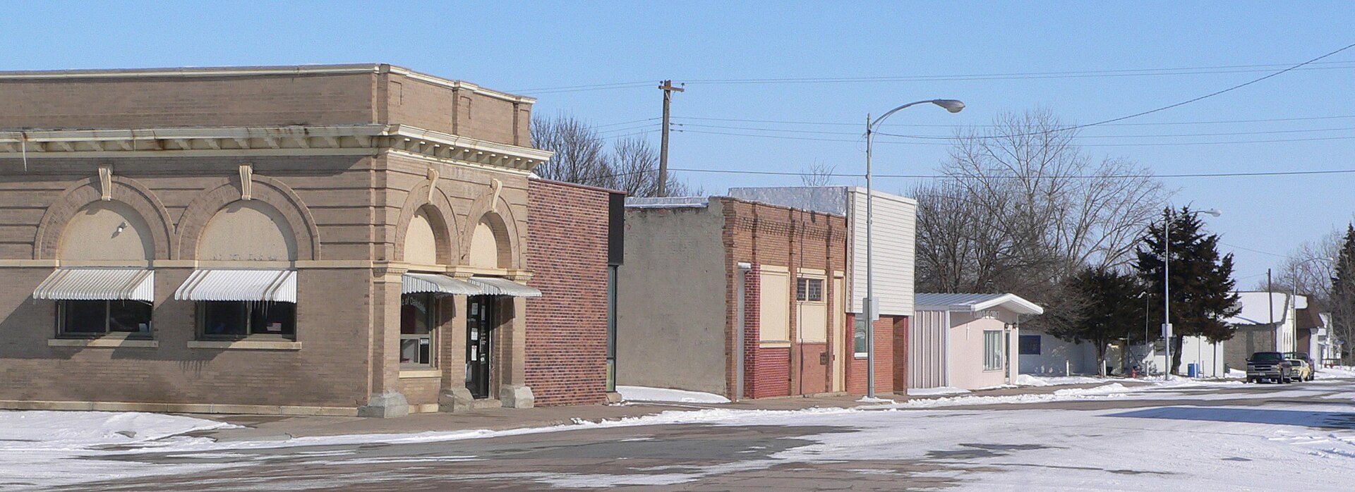 North side of 5th Street in Oakdale, Nebraska. At left is the Oakdale village hall.