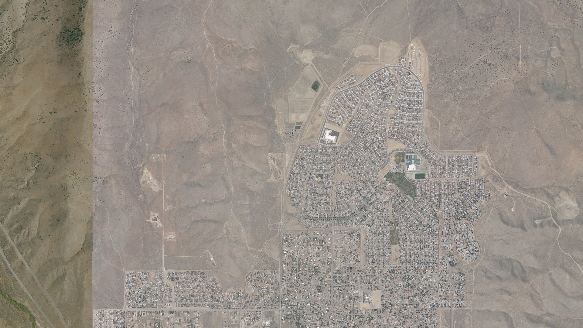 Natural-color aerial photograph of land around Cold Springs, Nevada