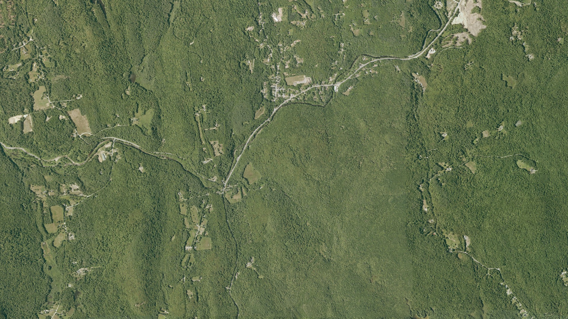 Natural-color aerial photograph of land around Gilsum, New Hampshire