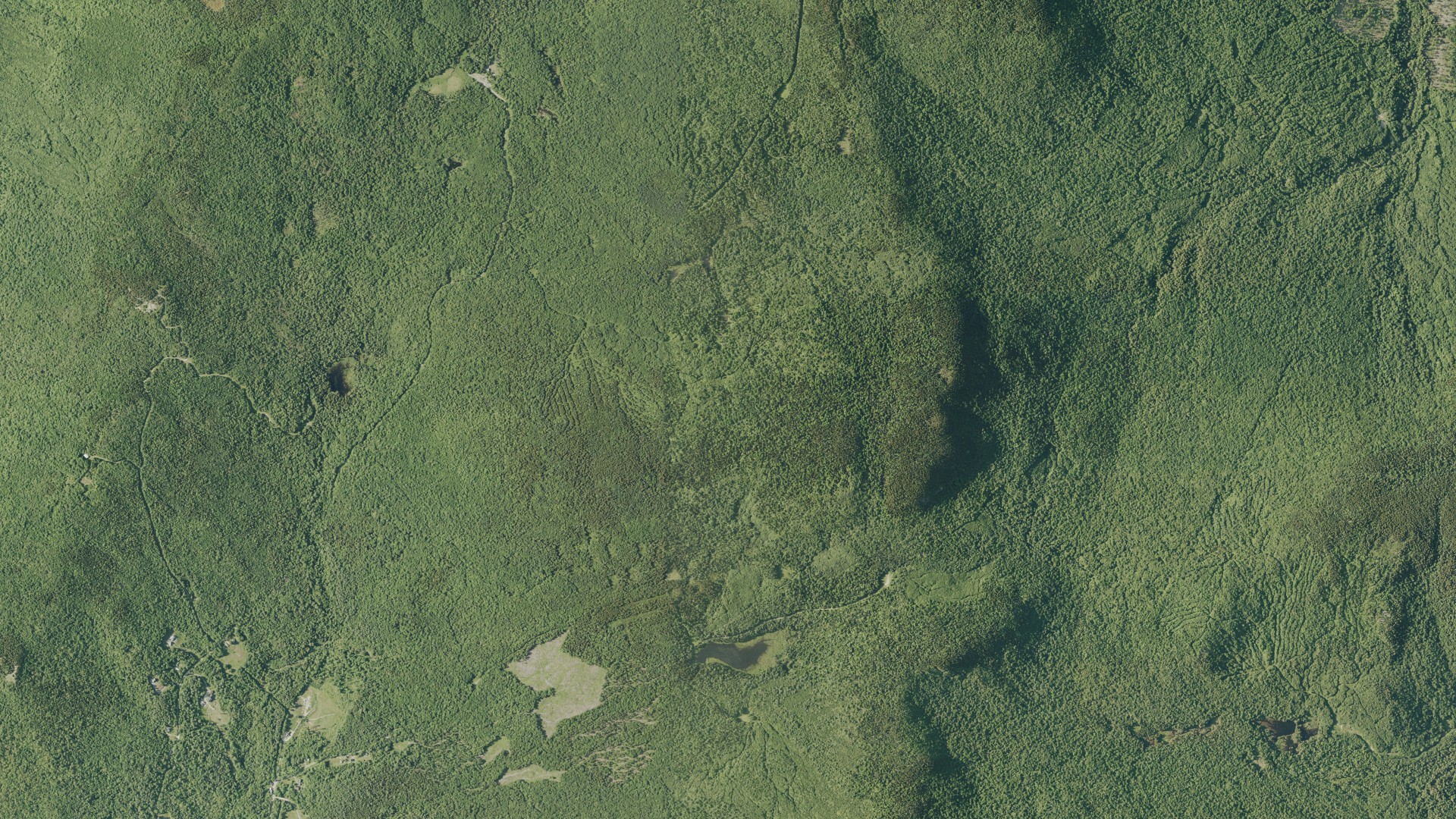 Natural-color aerial photograph of land around Orange, New Hampshire
