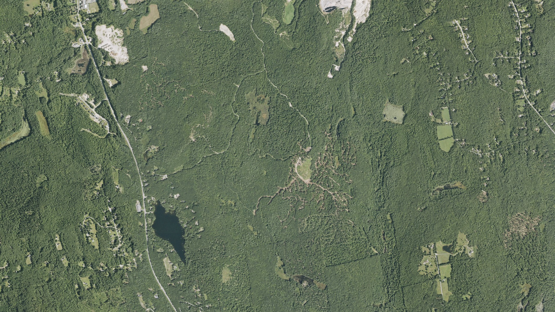 Natural-color aerial photograph of land around Weare, New Hampshire