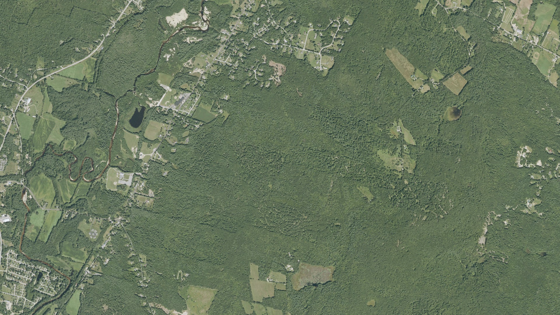 Natural-color aerial photograph of land around Epsom, New Hampshire