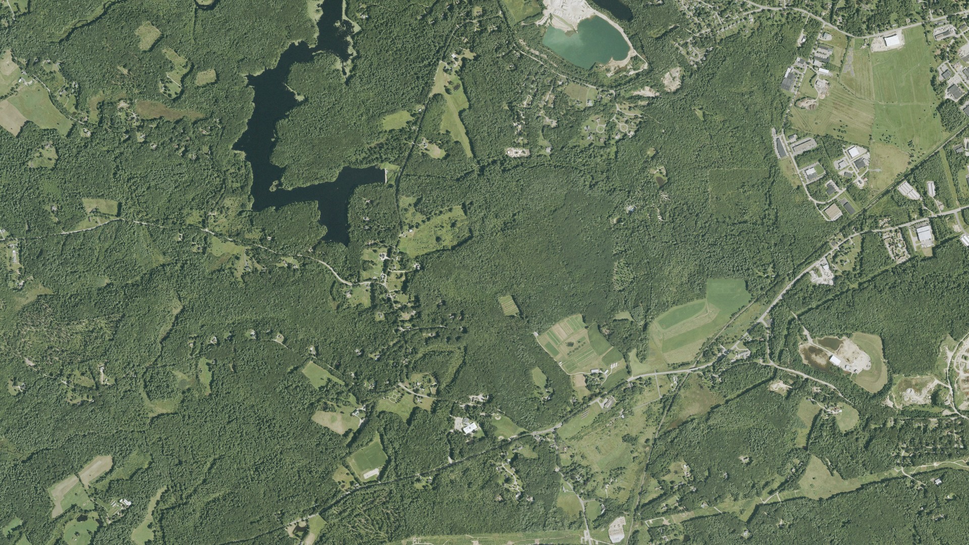Natural-color aerial photograph of land around Madbury, New Hampshire