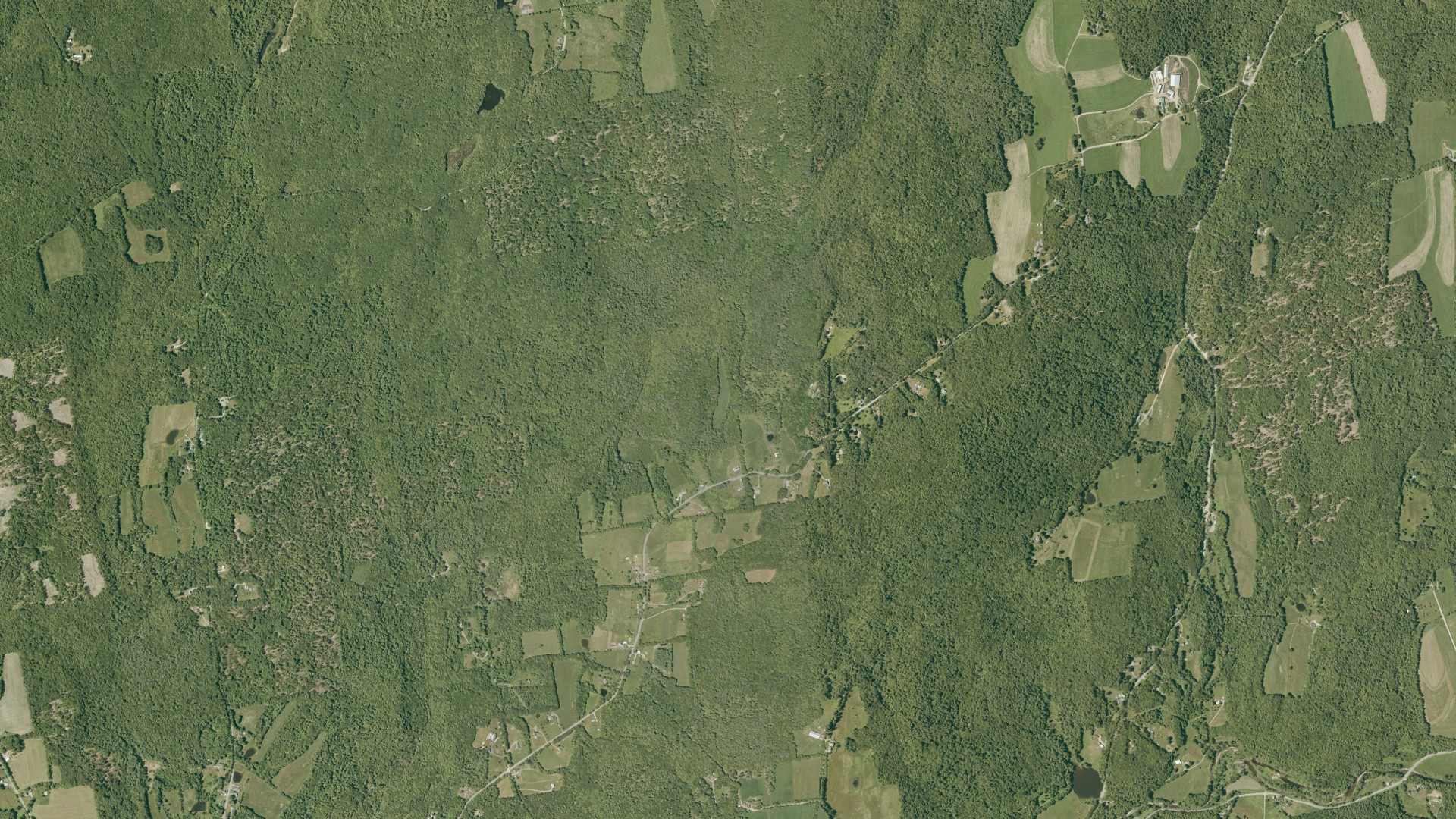 Natural-color aerial photograph of land around Langdon, New Hampshire