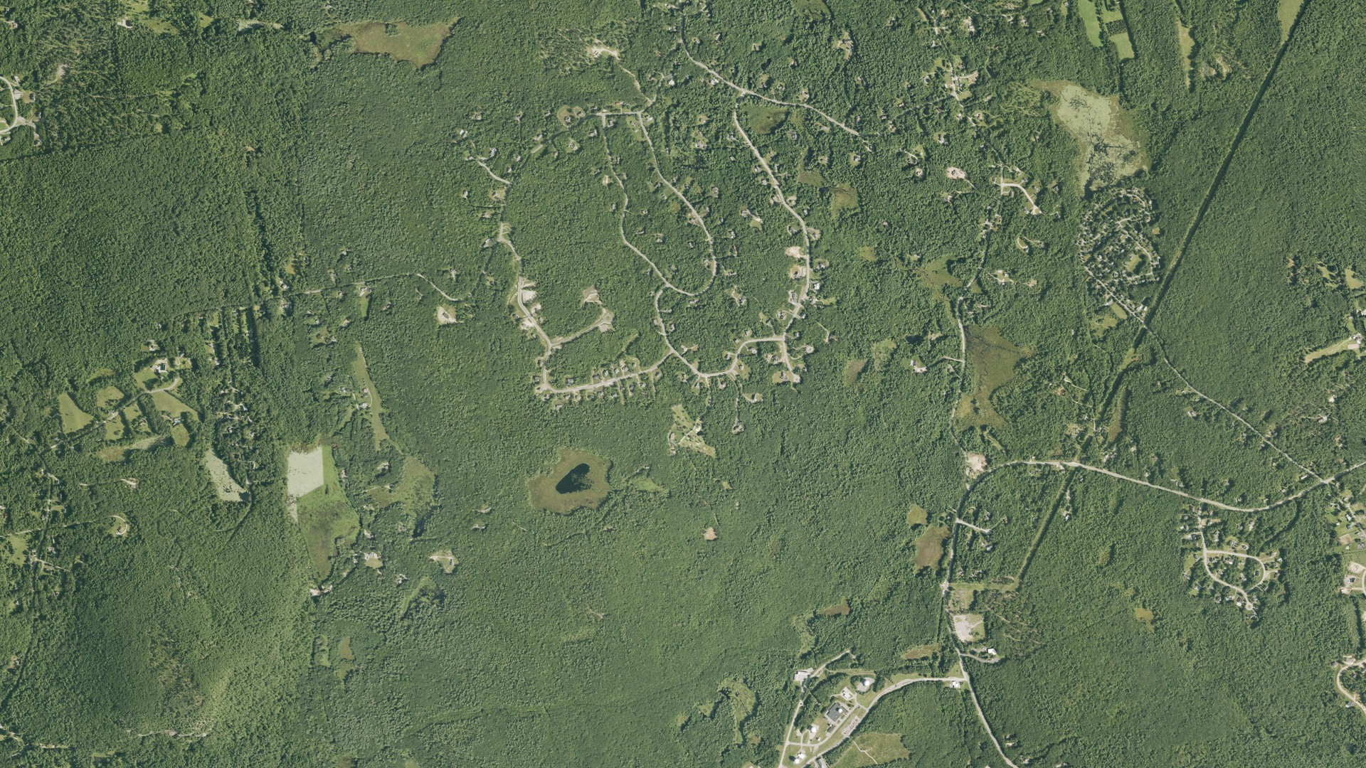 Natural-color aerial photograph of land around Klondike Corner, New Hampshire