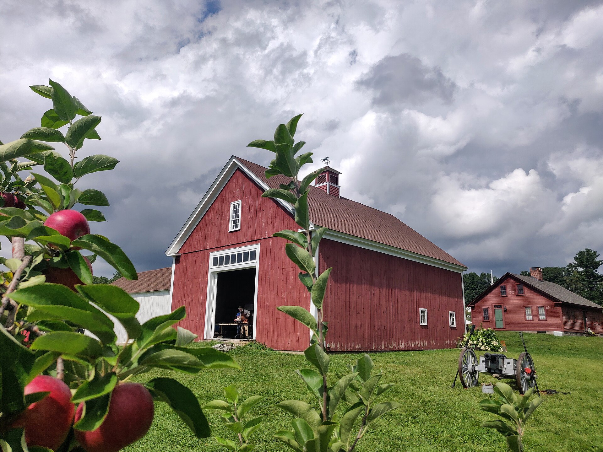 The Londonderry Historical Society's Morrison House Museum on Old Home Day 2021, with the Parmenter Barn in center and the Morrison House at back right. Viewed from Mack's Apples orchard. — New Hampshire