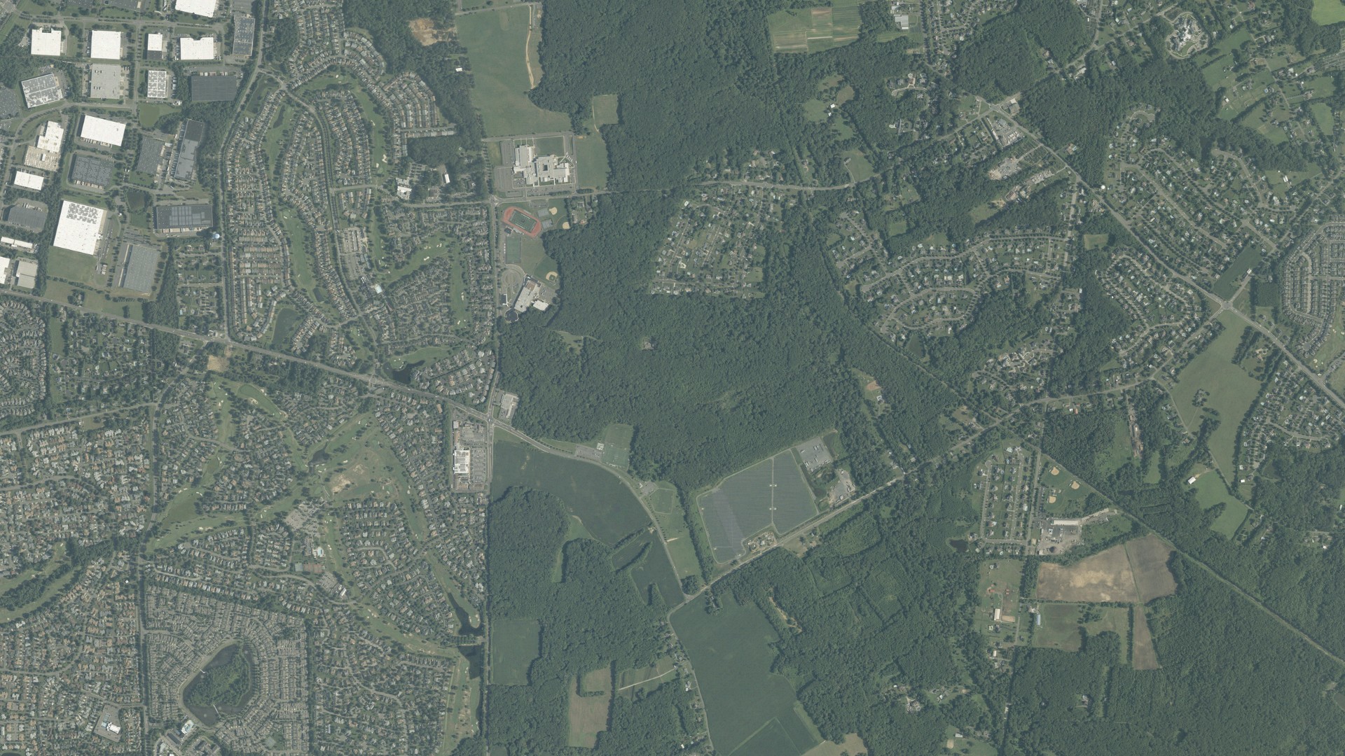 Natural-color aerial photograph of land around Monroe, New Jersey