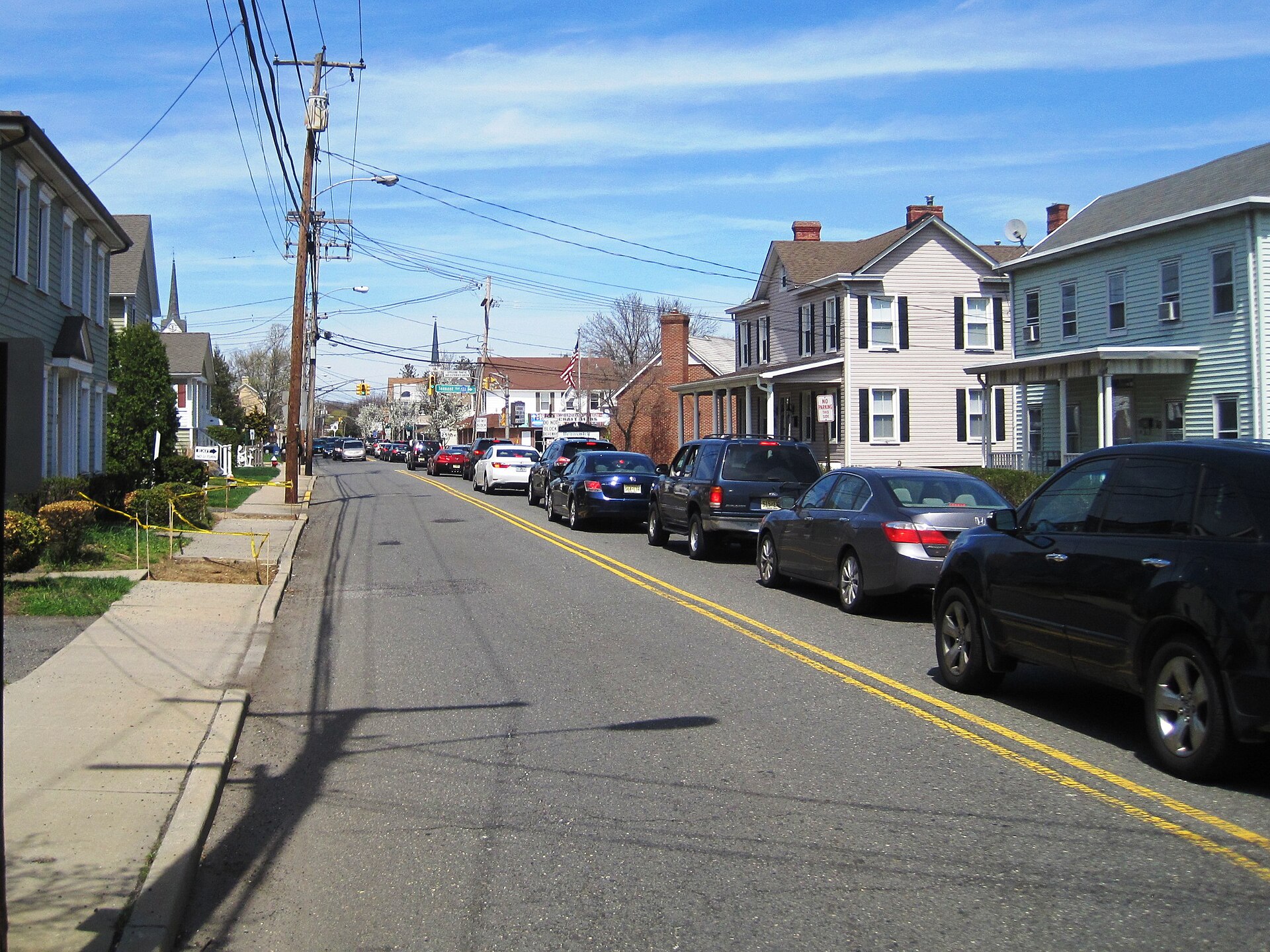 Photo of Englishtown, New Jersey, a borough in Monmouth County. Photo taken looking north along Main Street (County Route 527) towards Tennant Avenue (CR 522).
